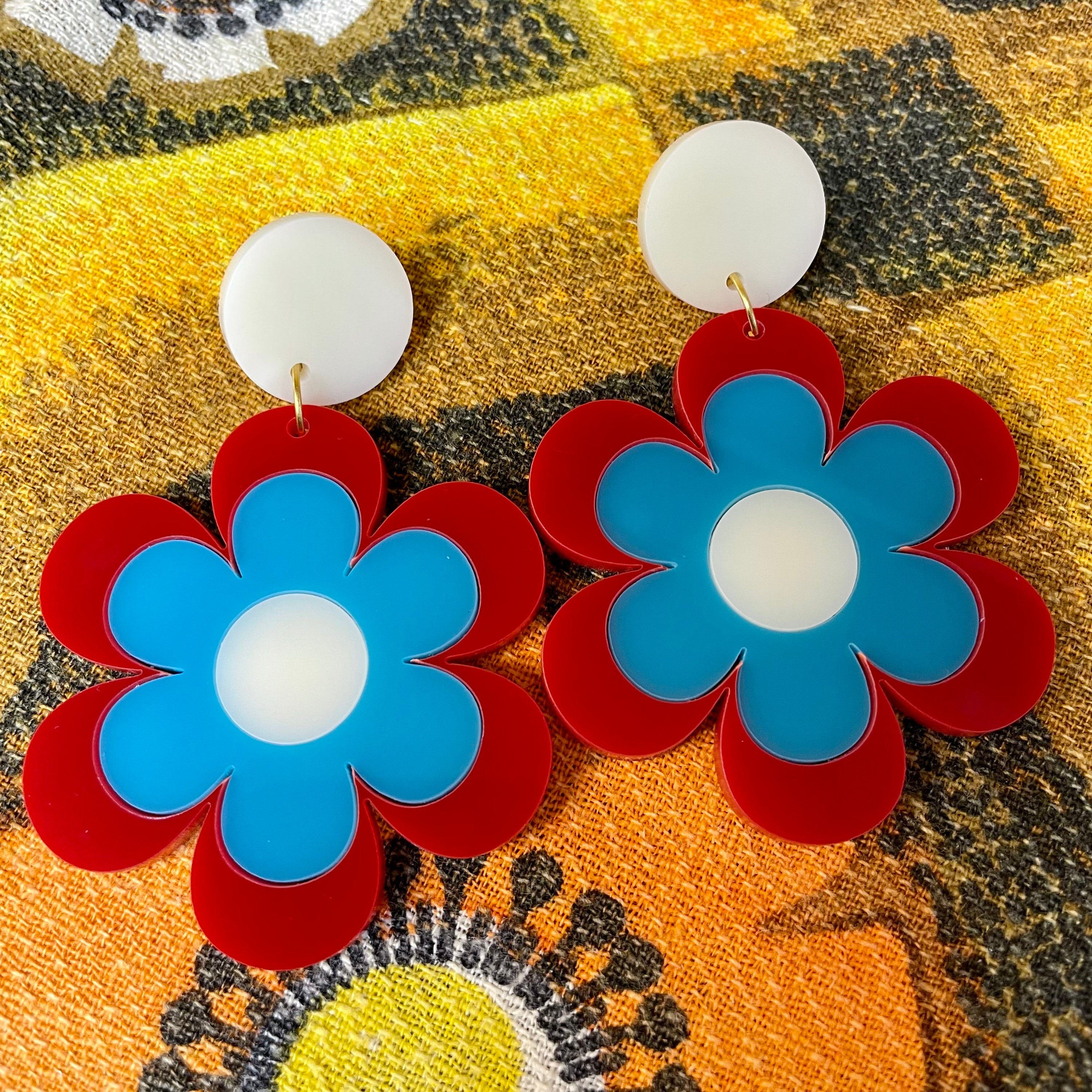 Delilah Daisy Earrings and Brooches featuring vibrant colors and retro design, made from laser-cut acrylic.