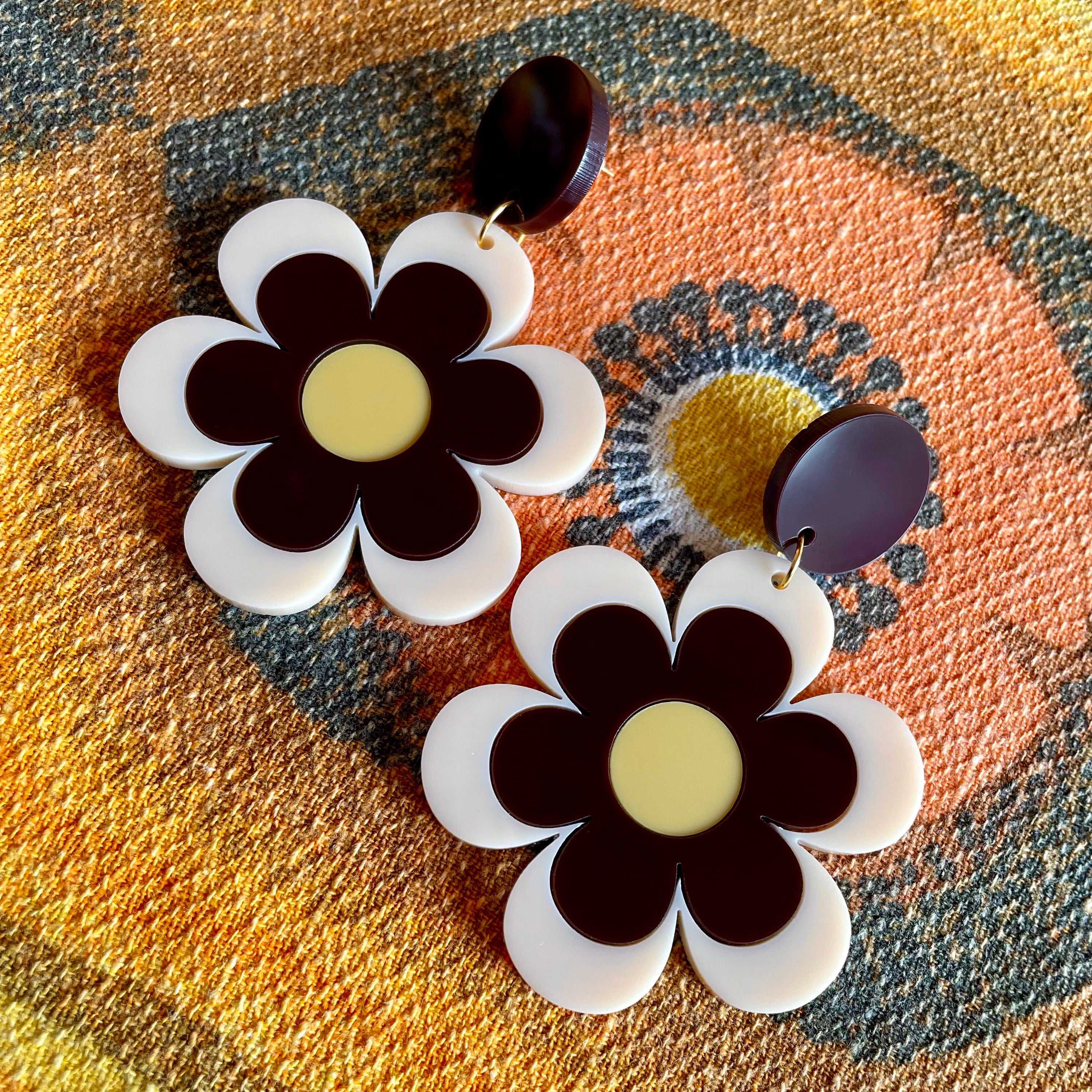 Delilah Daisy Earrings and Brooches featuring vibrant colors and retro design, made from laser-cut acrylic.