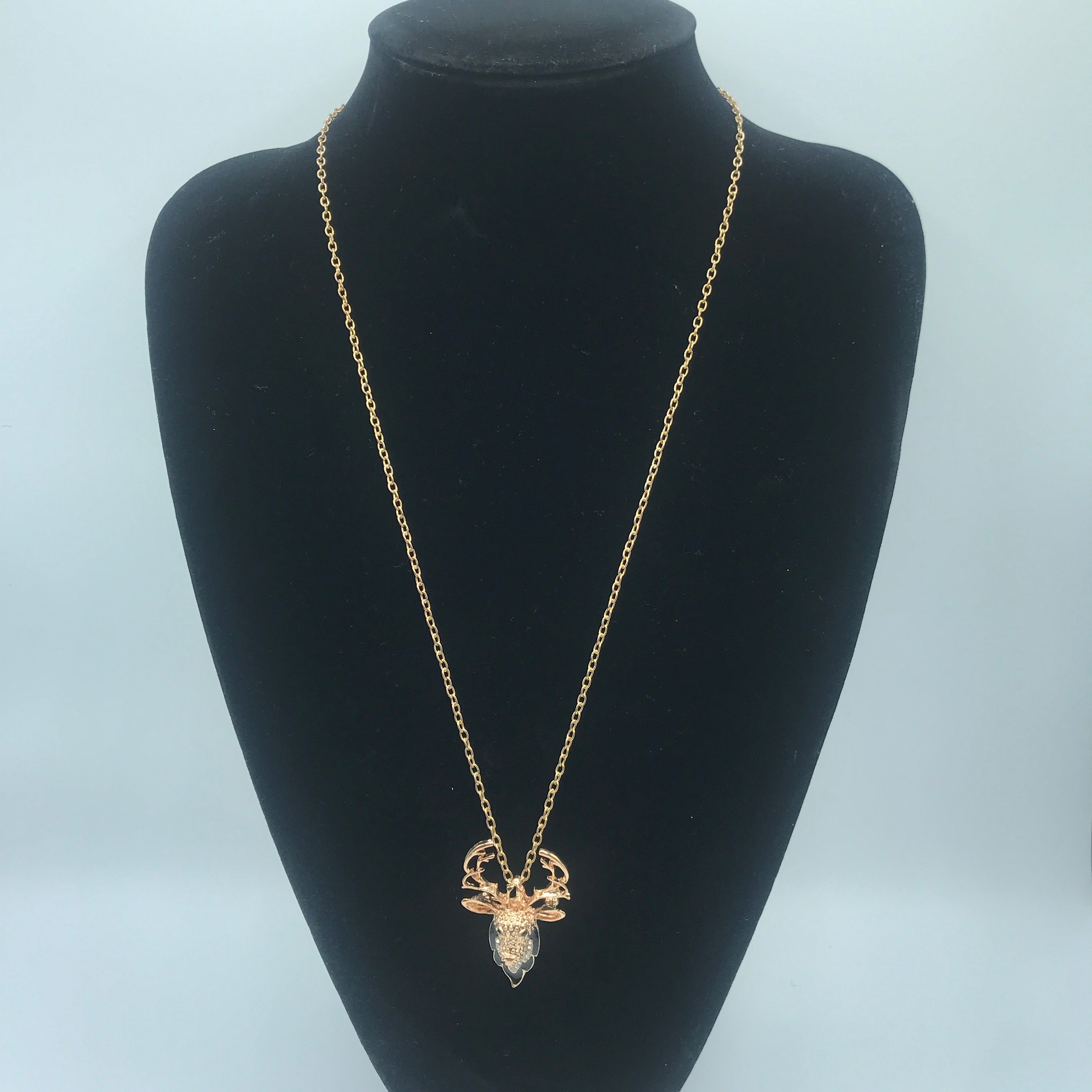 Elegant Deer dual-use brooch necklace made of alloy and rhinestones, showcasing its versatility as both a necklace and a brooch.