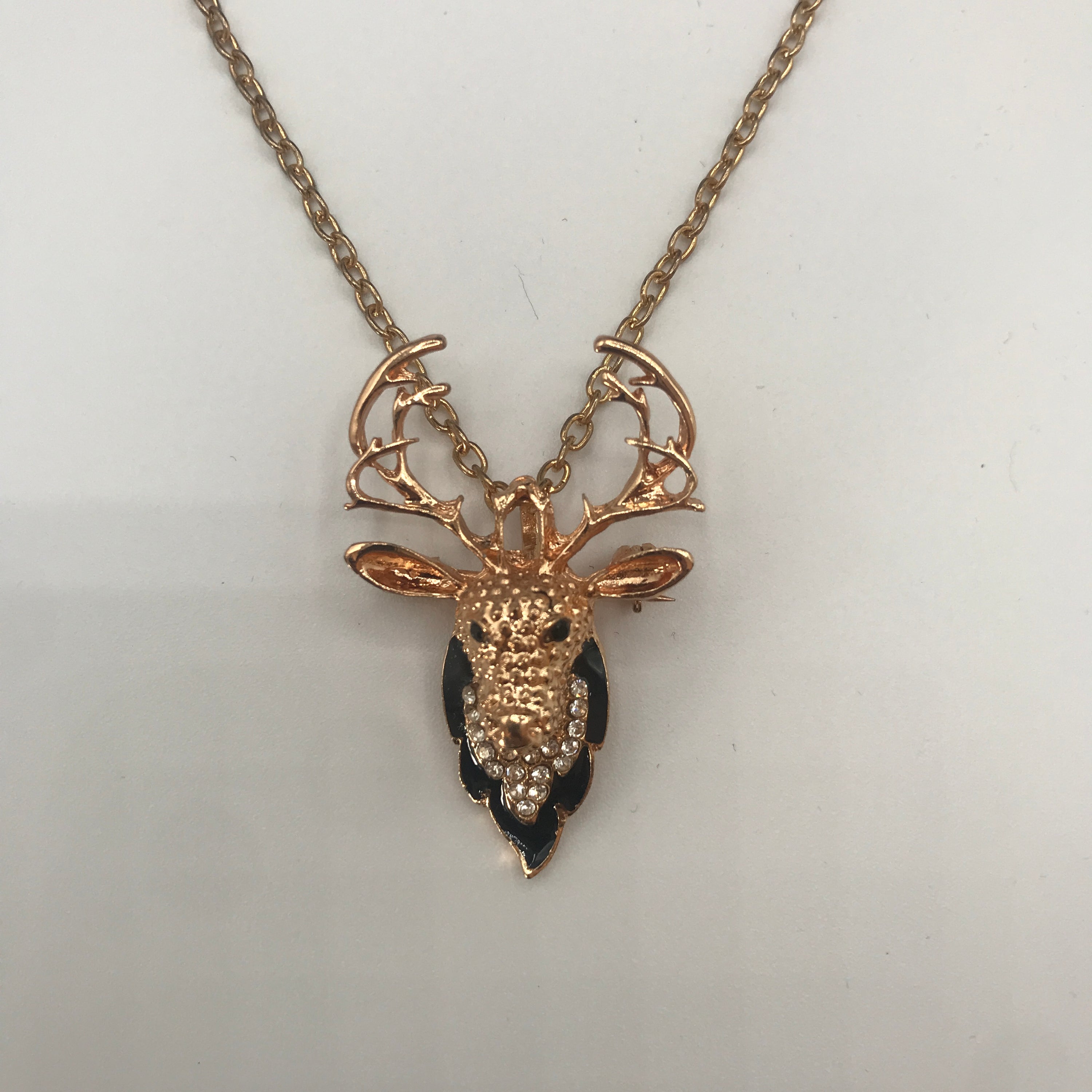 Elegant Deer dual-use brooch necklace made of alloy and rhinestones, showcasing its versatility as both a necklace and a brooch.