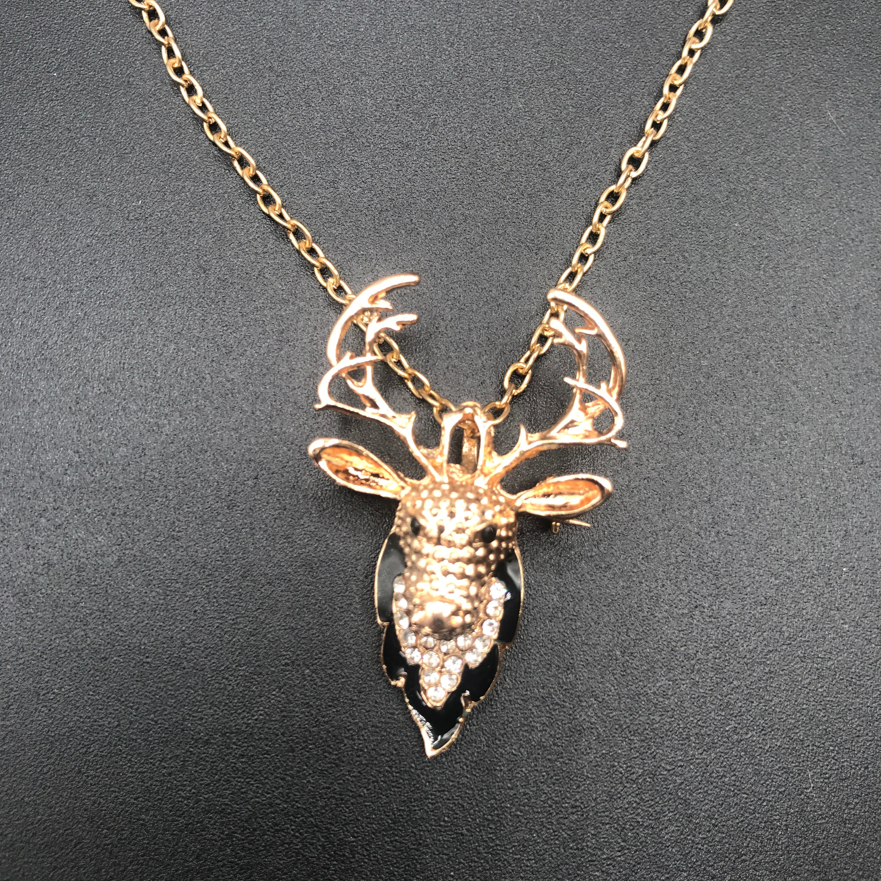 Elegant Deer dual-use brooch necklace made of alloy and rhinestones, showcasing its versatility as both a necklace and a brooch.