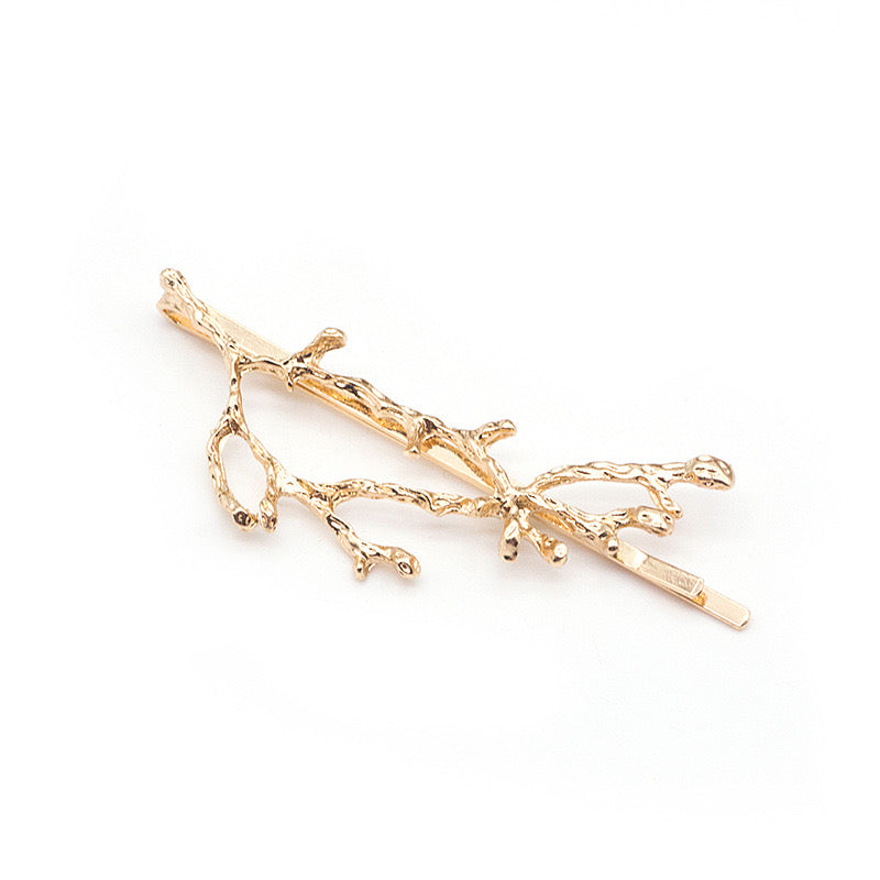 A stylish hair clip designed like deer horns and tree branches, made from durable alloy, measuring 6.3cm.