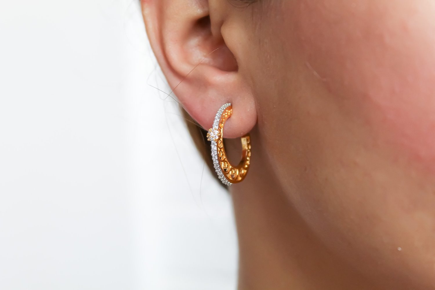 Elegant Diagonal Hoop Earrings in gold, rose gold, and black, featuring sparkling zircon stones, perfect for any occasion.