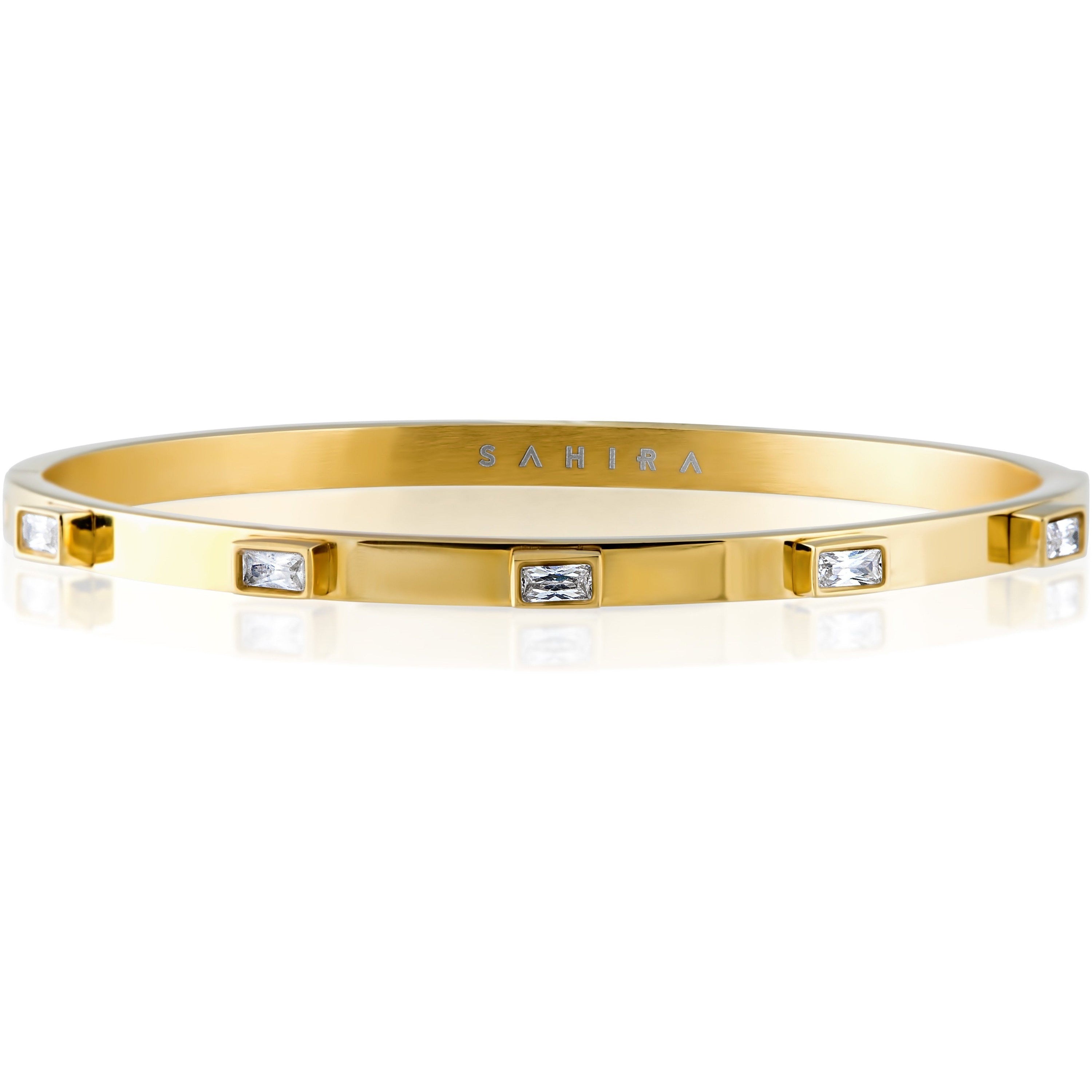 Elegant 18k gold plated stainless steel bangle bracelet adorned with sparkling CZ baguette stones, perfect for stacking.