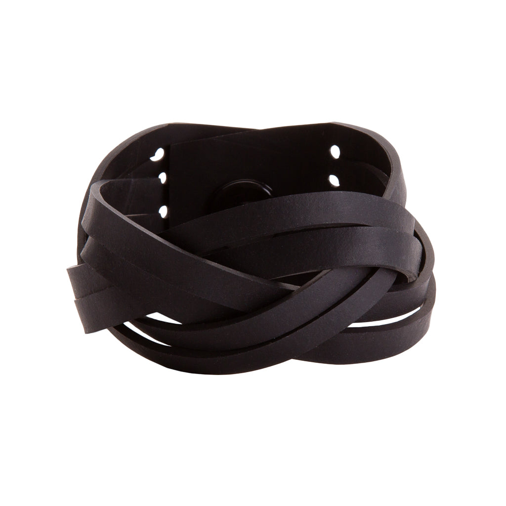 Dimension Recycled Rubber Bracelet featuring a plaited design made from reclaimed tyre inner tubes, showcasing its unique texture and eco-friendly craftsmanship.