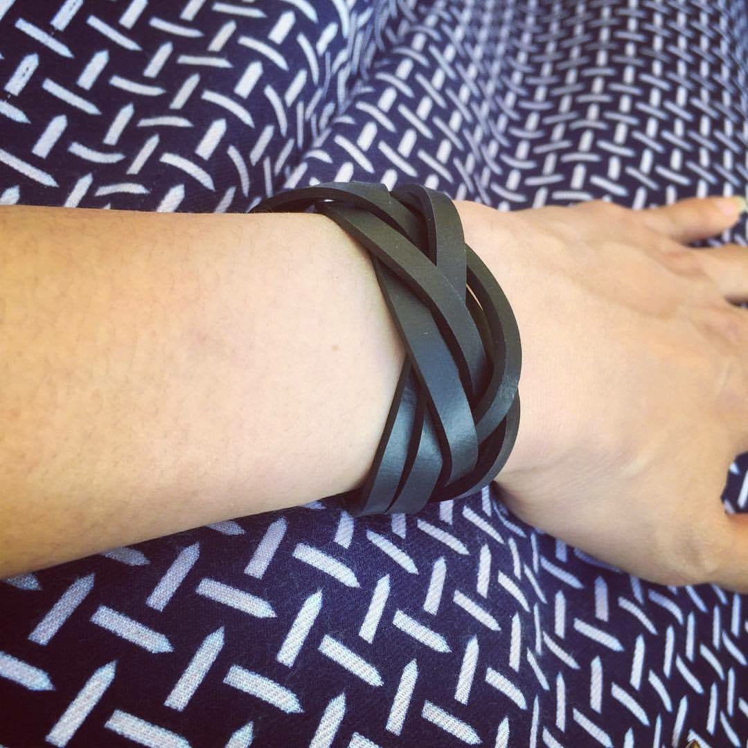 Dimension Recycled Rubber Bracelet featuring a plaited design made from reclaimed tyre inner tubes, showcasing its unique texture and eco-friendly craftsmanship.