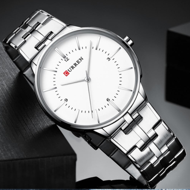 Discreet Curren Classic Metal I 551171 watch with minimalist design and adjustable links.