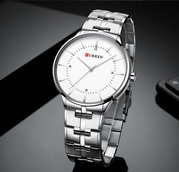 Discreet Curren Classic Metal I 551171 watch with minimalist design and adjustable links.