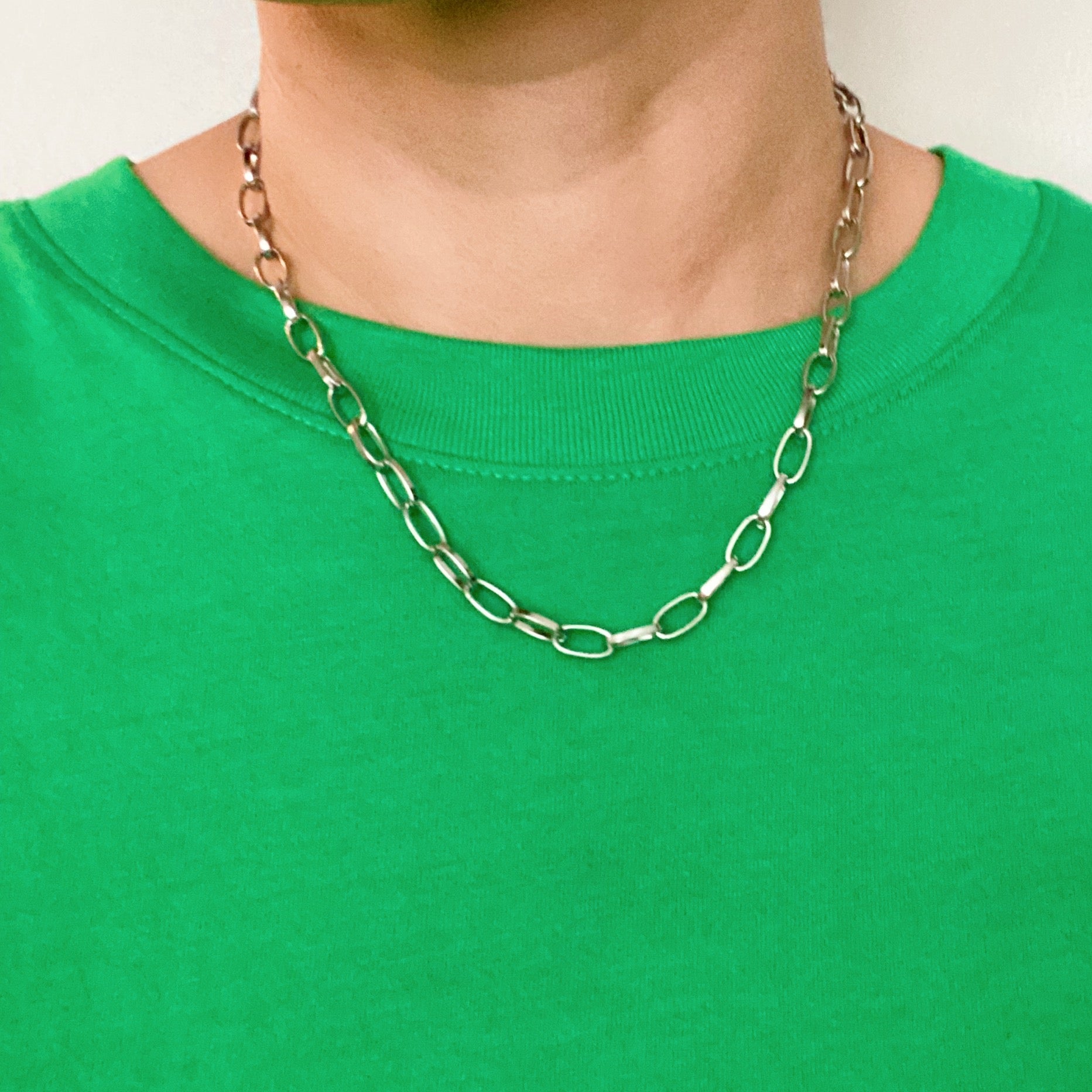 A stylish Do It All Link Chain Necklace featuring a two-tone design in silver and gold, adjustable length, and a toggle closure.