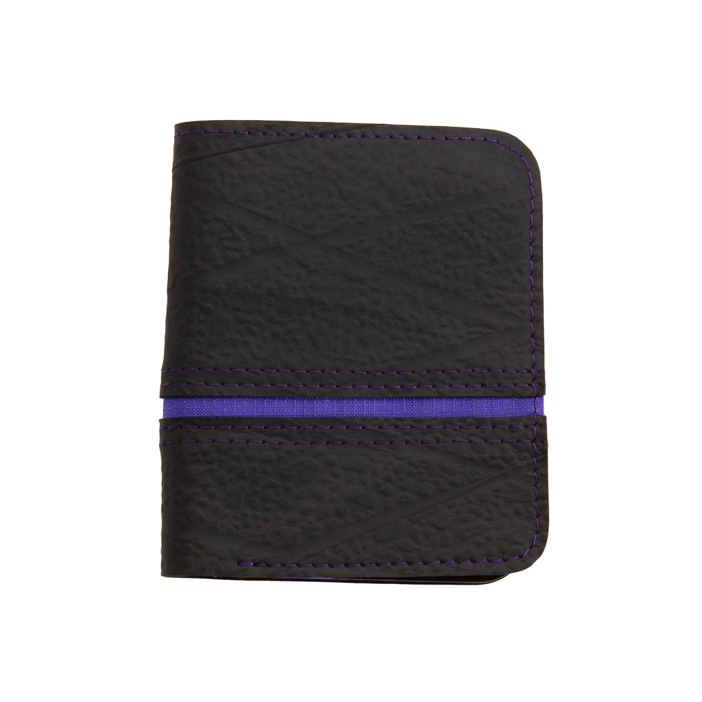 Dody Slimline Inner Tube Wallet showcasing unique recycled rubber texture and vibrant stitching, available in multiple colors.