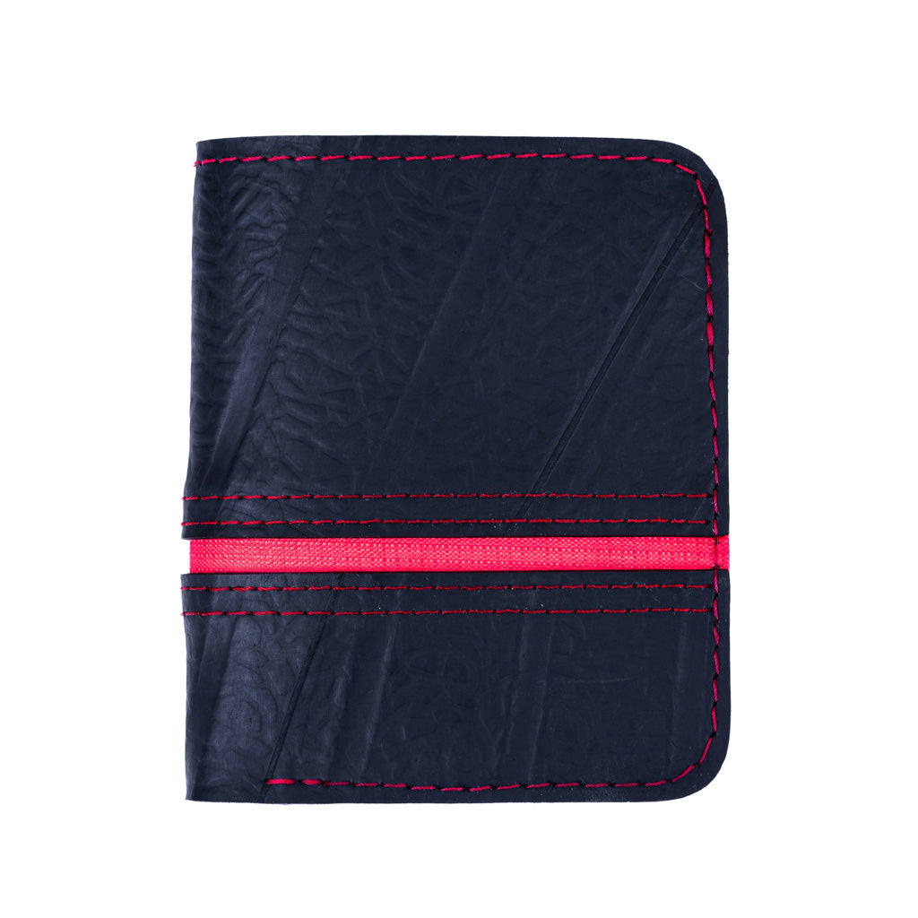 Dody Slimline Inner Tube Wallet showcasing unique recycled rubber texture and vibrant stitching, available in multiple colors.