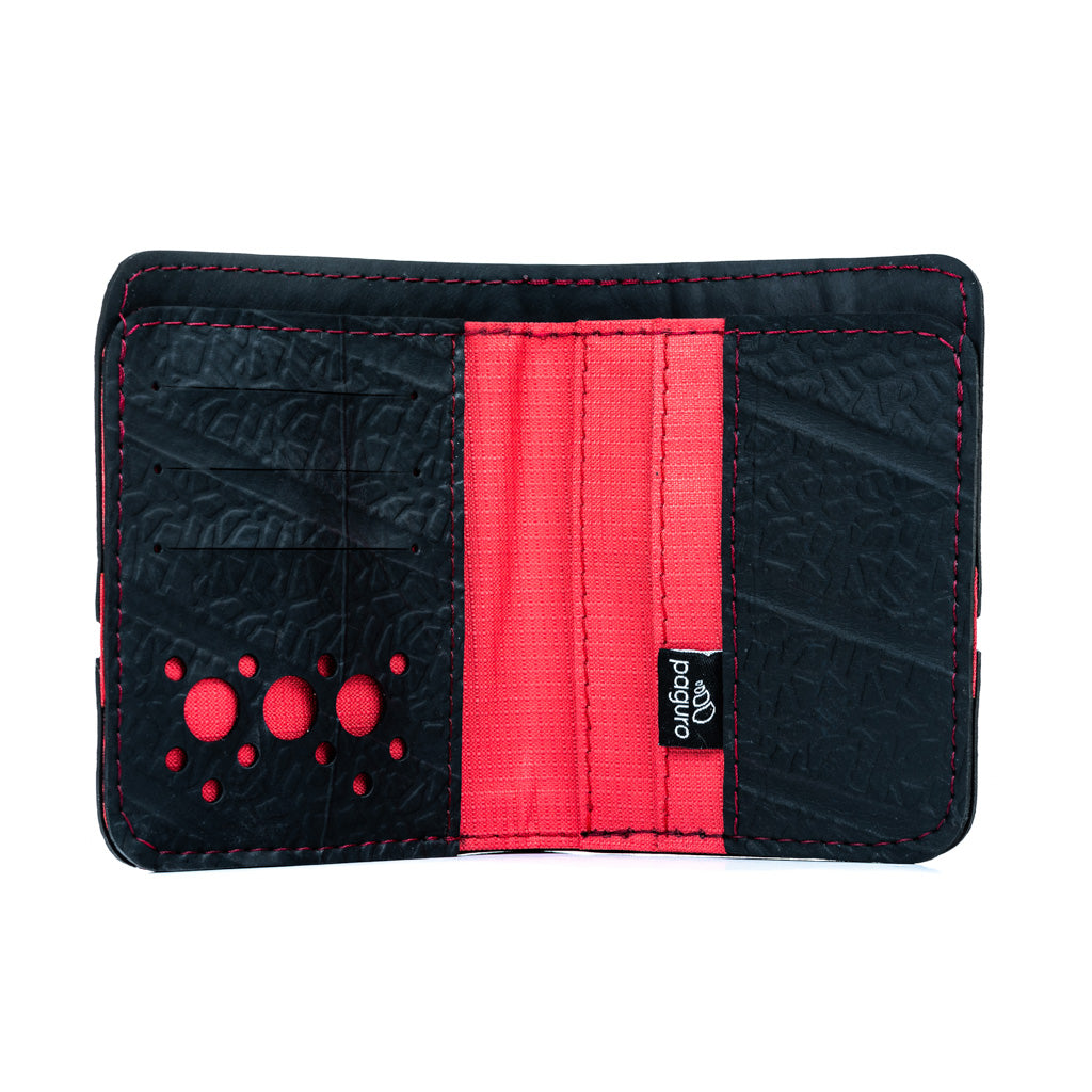 Dody Slimline Inner Tube Wallet showcasing unique recycled rubber texture and vibrant stitching, available in multiple colors.