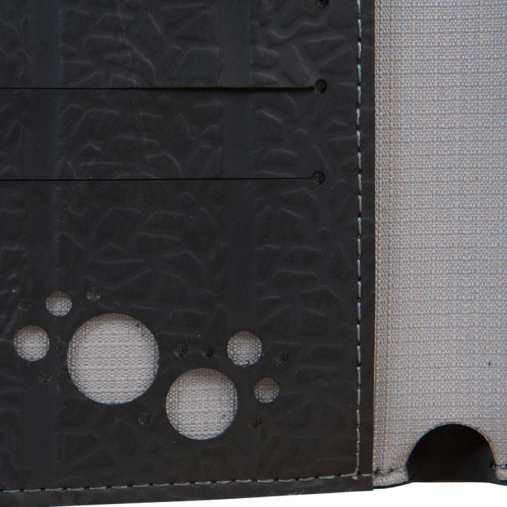 Dody Slimline Inner Tube Wallet showcasing unique recycled rubber texture and vibrant stitching, available in multiple colors.