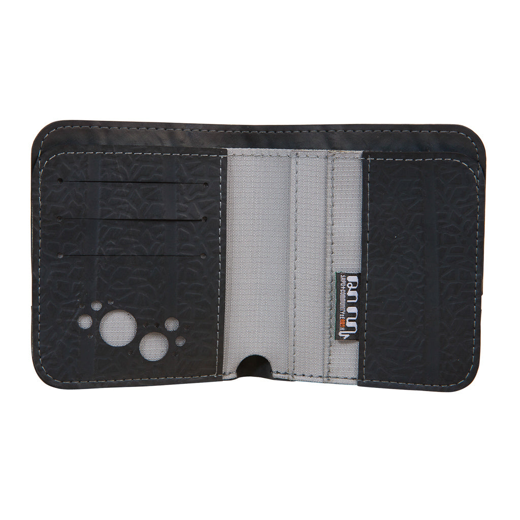 Dody Slimline Inner Tube Wallet showcasing unique recycled rubber texture and vibrant stitching, available in multiple colors.