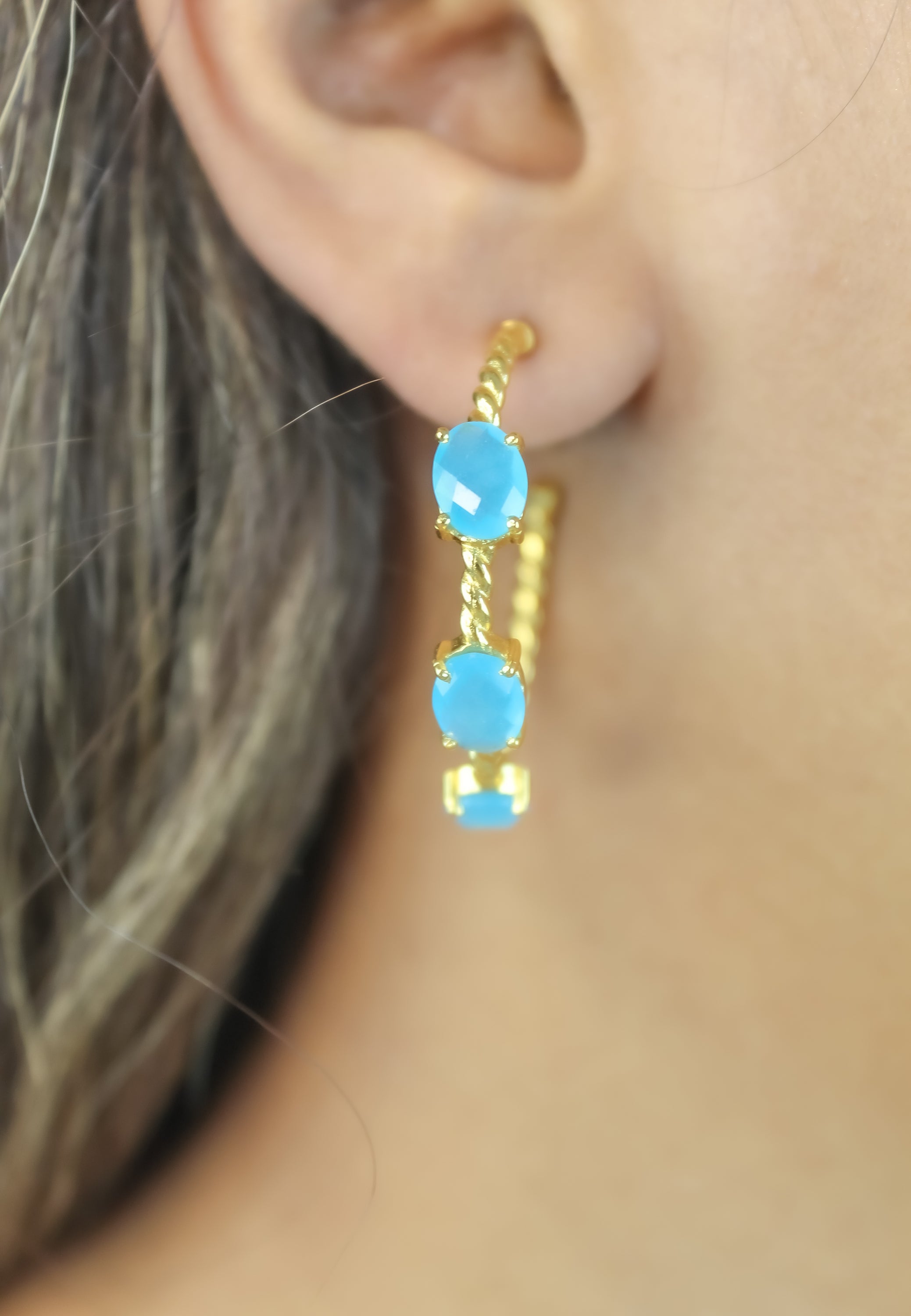 Elegant Doha Earrings featuring 18K gold plating and natural semi-precious stones, designed for pierced ears.