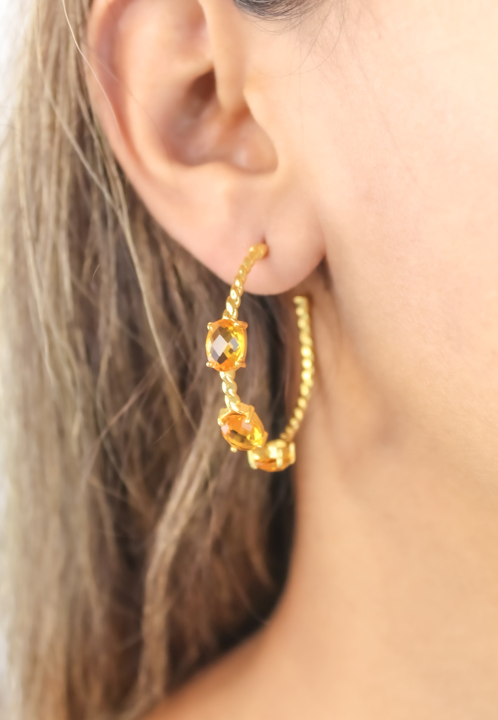 Elegant Doha Earrings featuring 18K gold plating and natural semi-precious stones, designed for pierced ears.