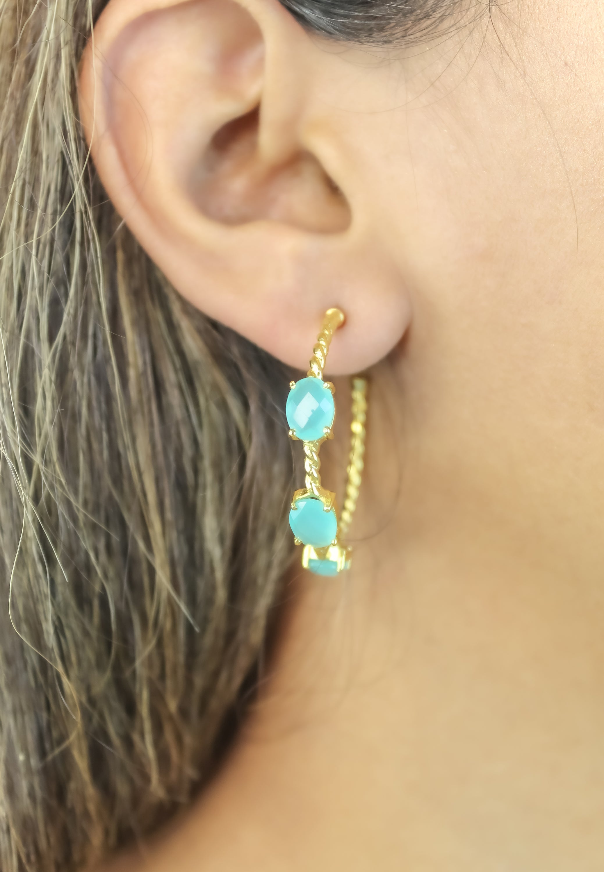 Elegant Doha Earrings featuring 18K gold plating and natural semi-precious stones, designed for pierced ears.