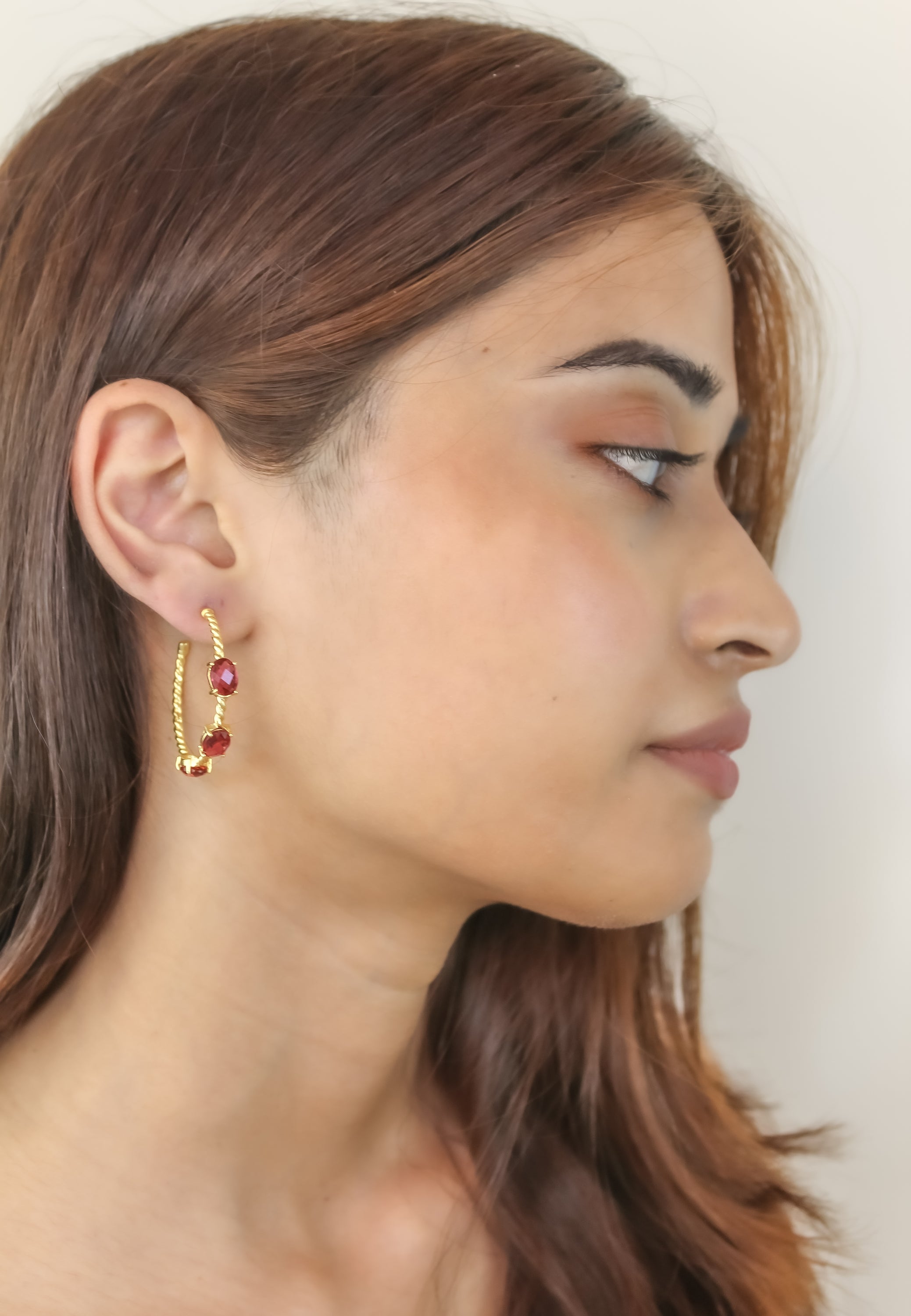 Elegant Doha Earrings featuring 18K gold plating and natural semi-precious stones, designed for pierced ears.