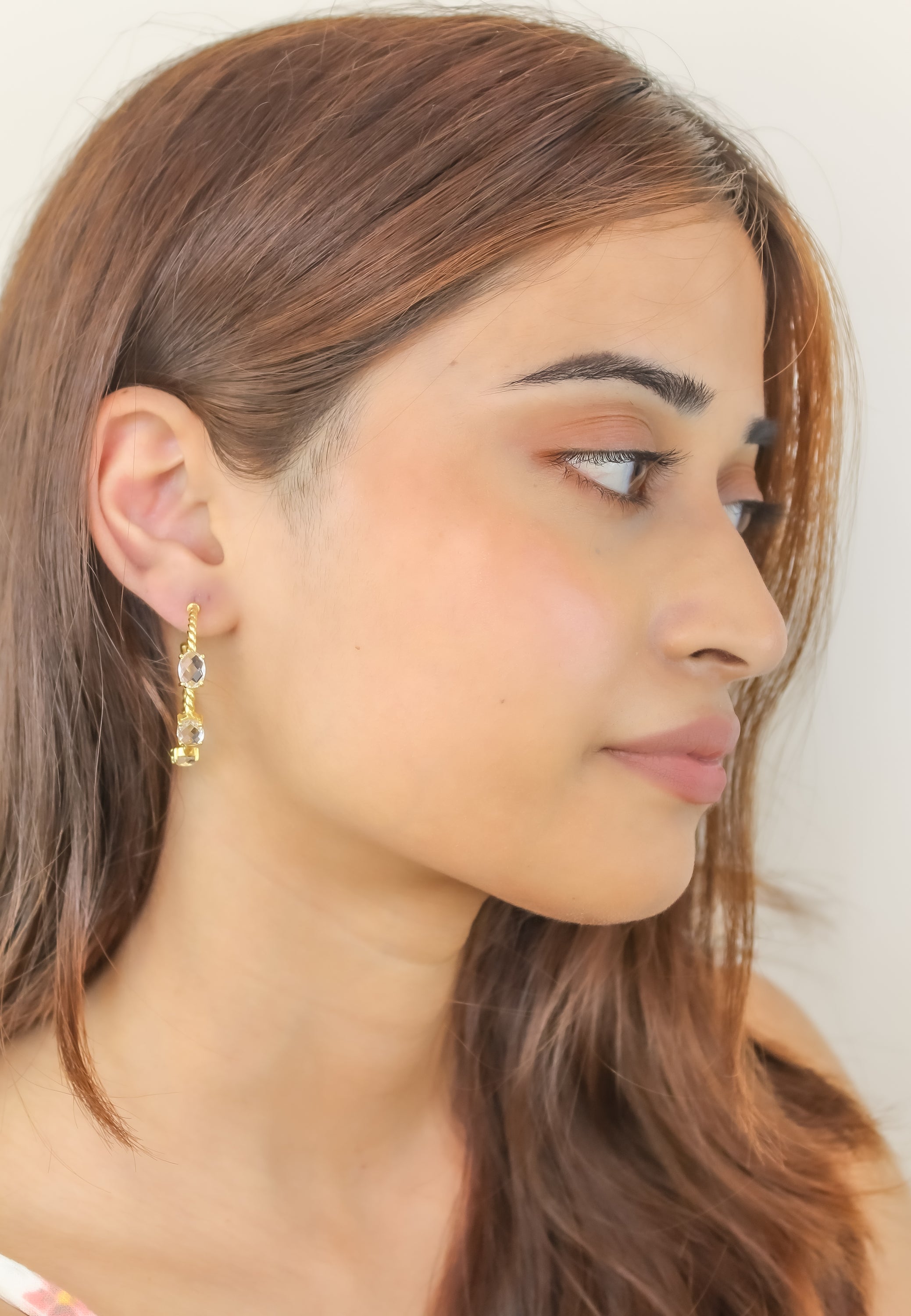 Elegant Doha Earrings featuring 18K gold plating and natural semi-precious stones, designed for pierced ears.