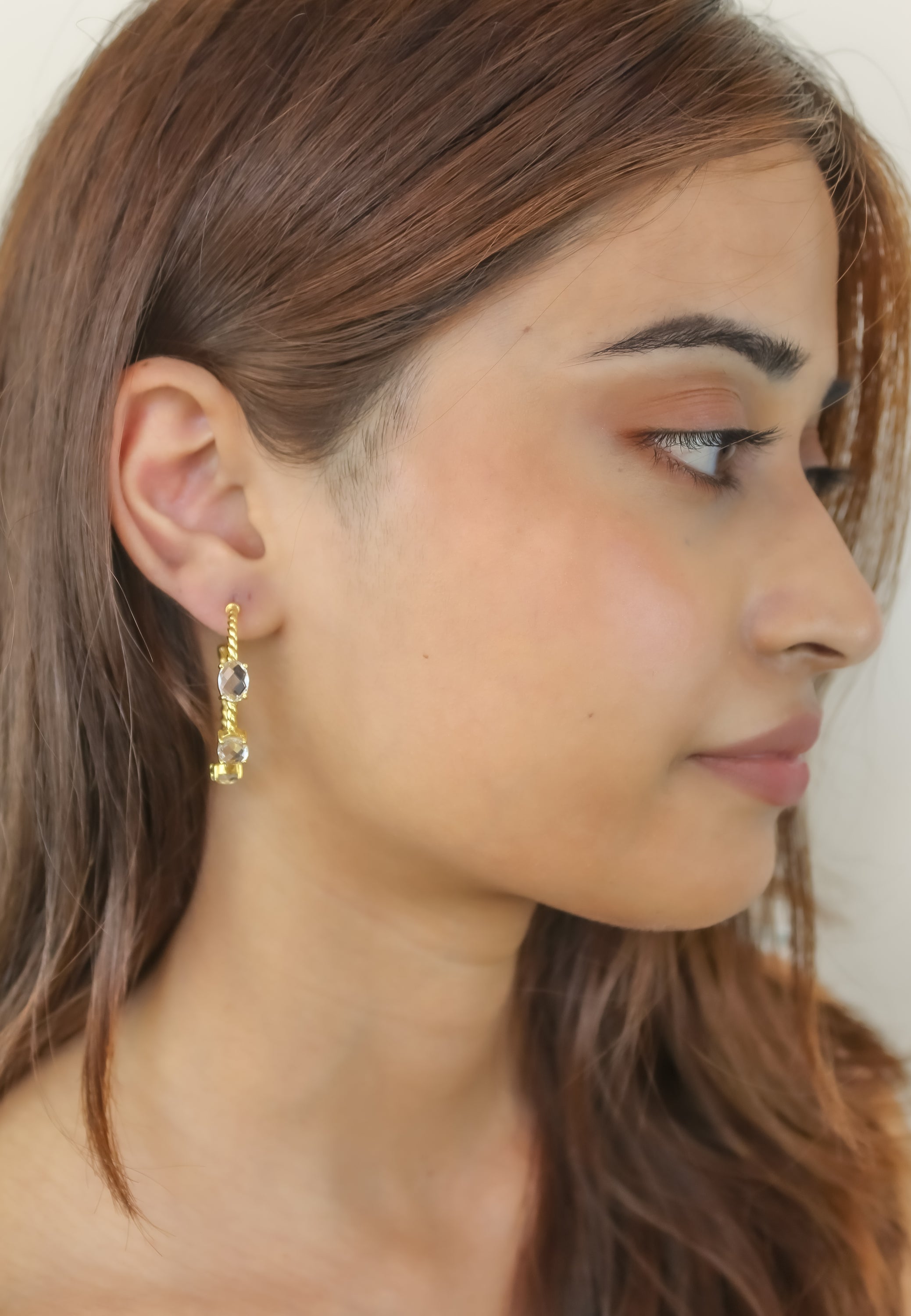 Elegant Doha Earrings featuring 18K gold plating and natural semi-precious stones, designed for pierced ears.