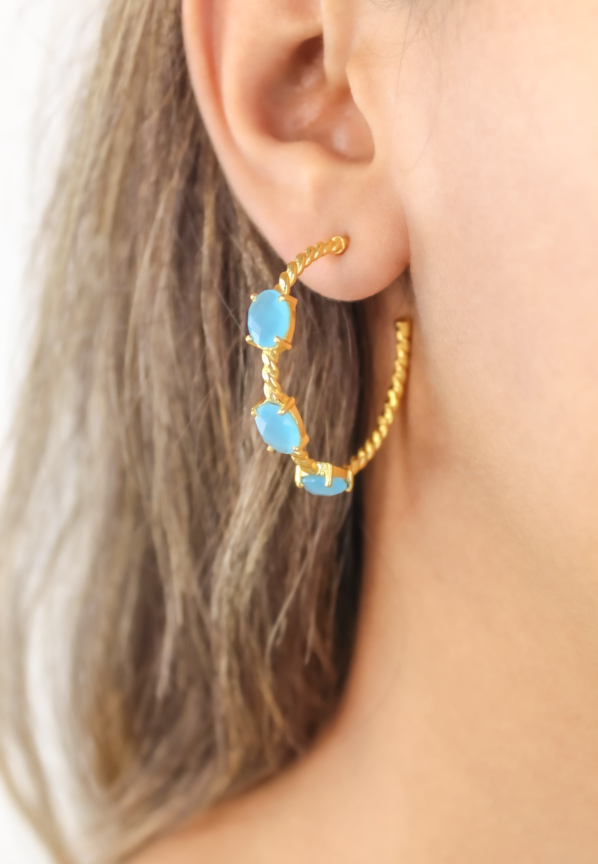 Elegant Doha Earrings featuring 18K gold plating and natural semi-precious stones, designed for pierced ears.