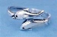 A beautiful adjustable Dolphin Toe Ring made of sterling silver, featuring a playful dolphin design, perfect for beach lovers.