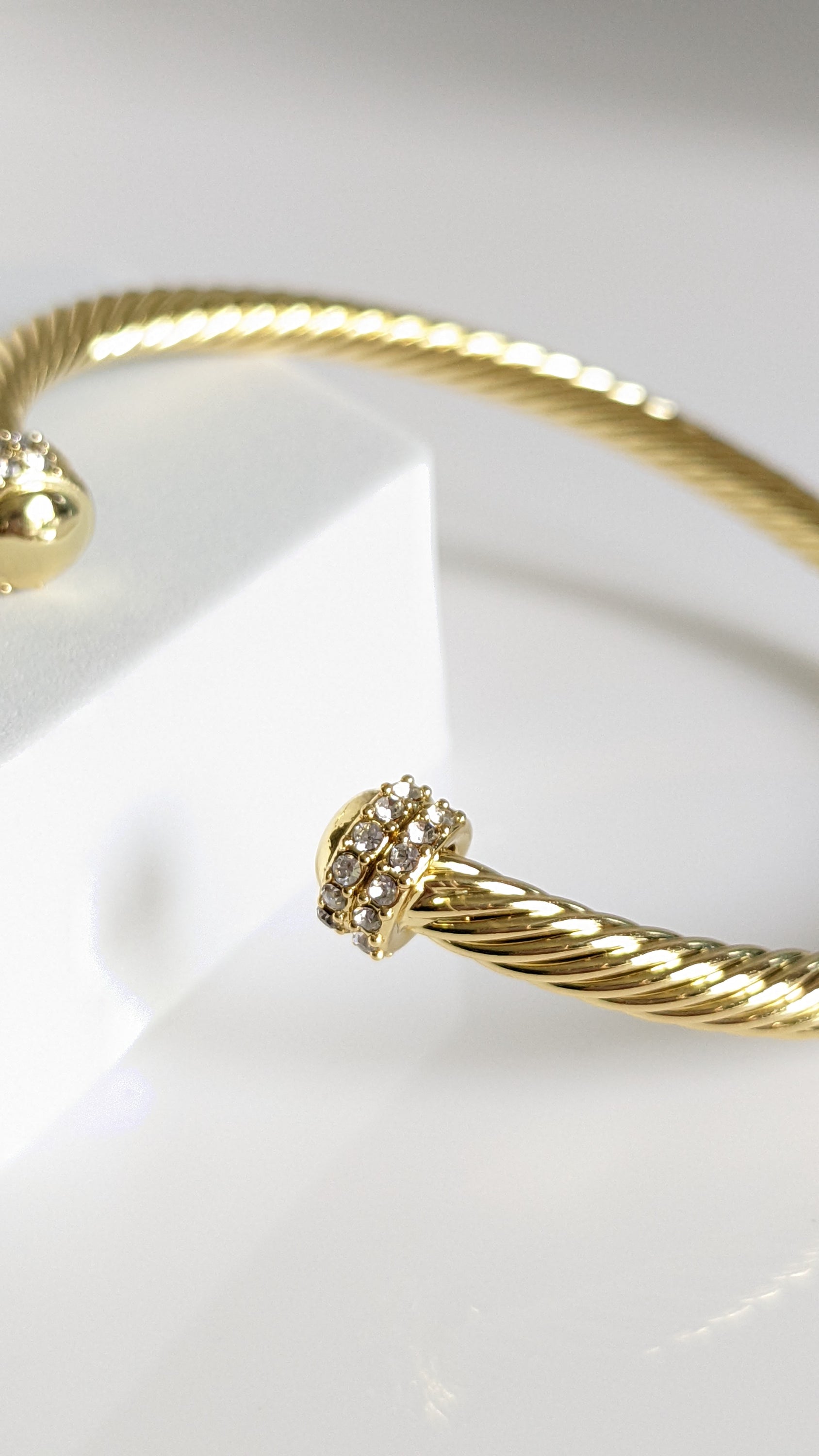 Elegant Dome Crystals Bangle featuring 18K Gold Filled material with a gold dome pattern and simulated diamonds, perfect for stacking.