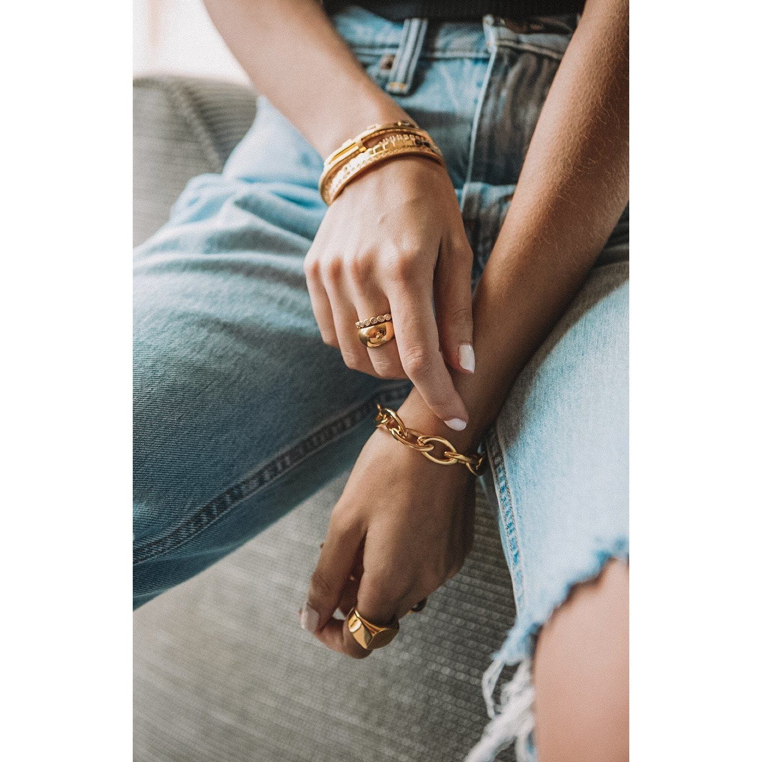 A sleek and polished gold dome ring, medium-sized, perfect for stacking or everyday wear.