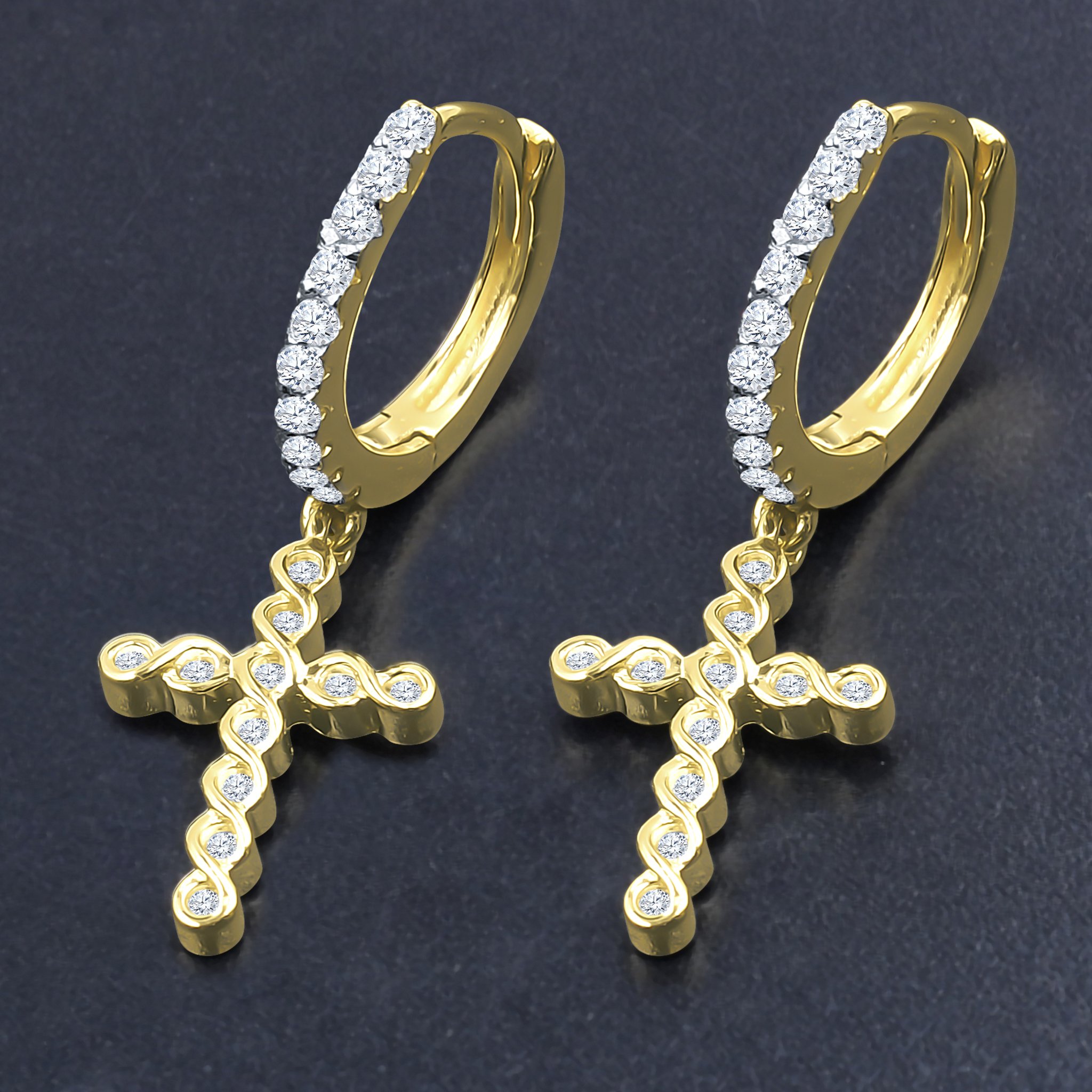 DOMINIQUE Silver Earrings featuring a cross design and cubic zirconia embellishments, elegantly displayed on a soft background.