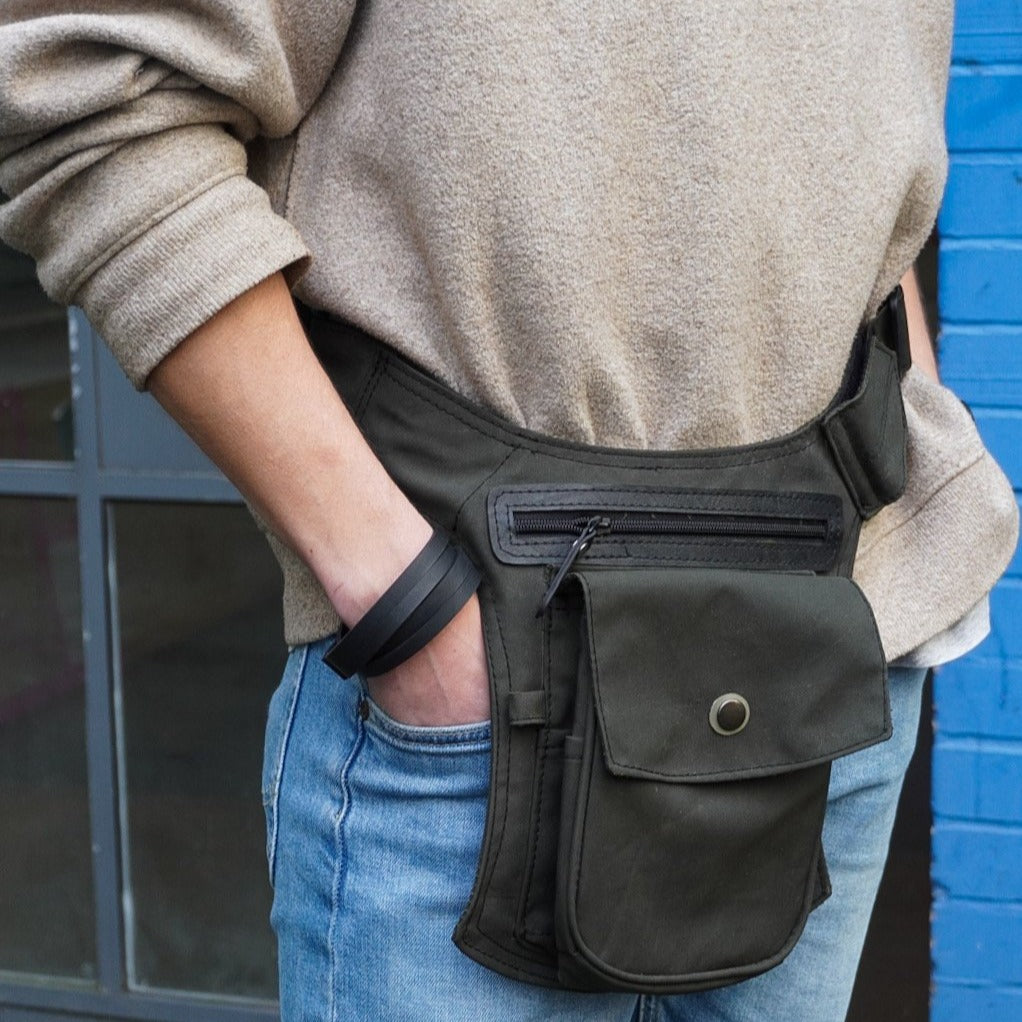 Donald Recycled Canvas Vegan Crossbody Bag featuring adjustable strap, waterproof material, and unique handmade design.