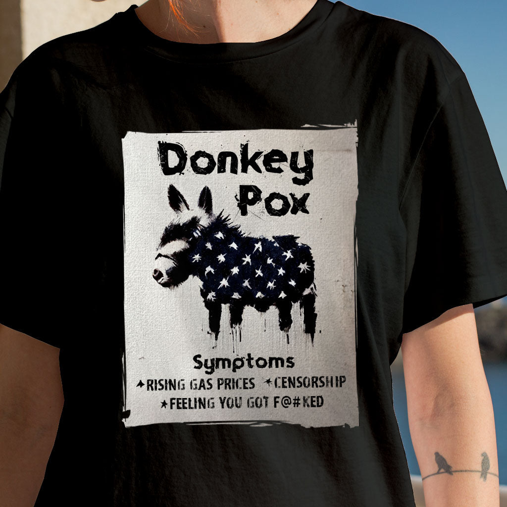 A humorous Donkey Pox T-Shirt made in the USA, featuring a playful text design on a soft jersey fabric.