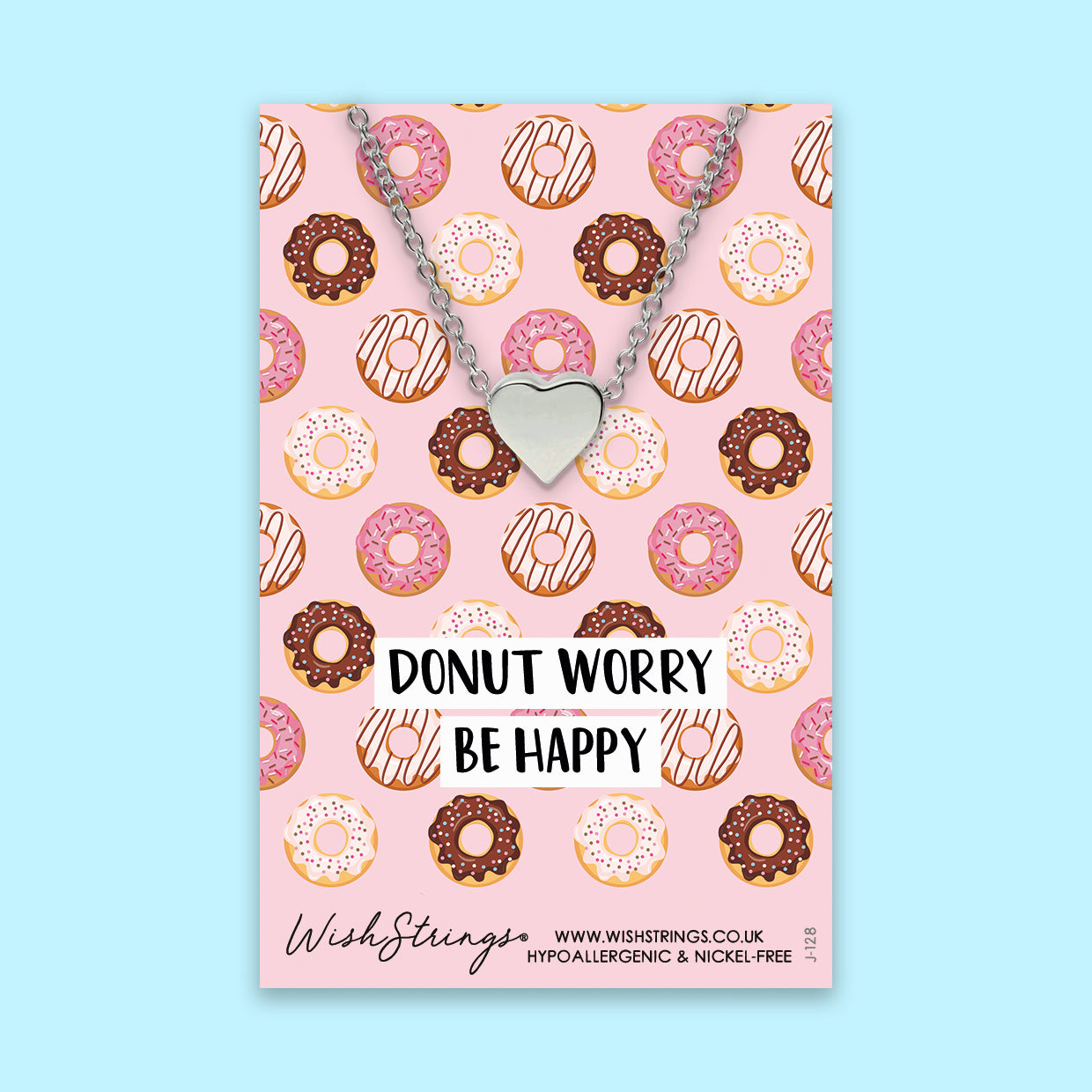 A beautiful handmade heart necklace with a donut design, symbolizing love and positivity, presented on a gift card.