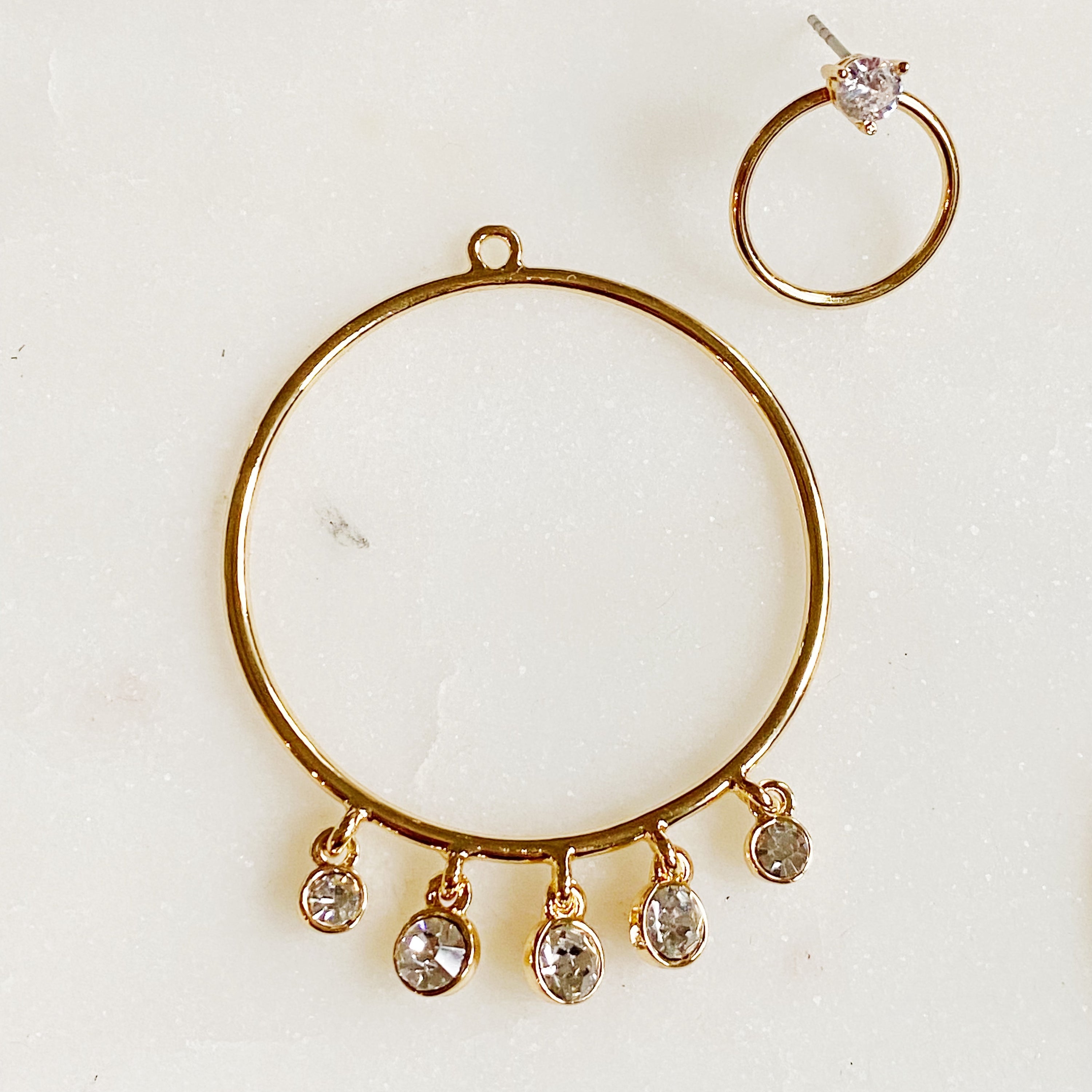 Elegant Double Circle Front Back Hoop Earrings featuring 18K gold plating and cubic zirconia stones.