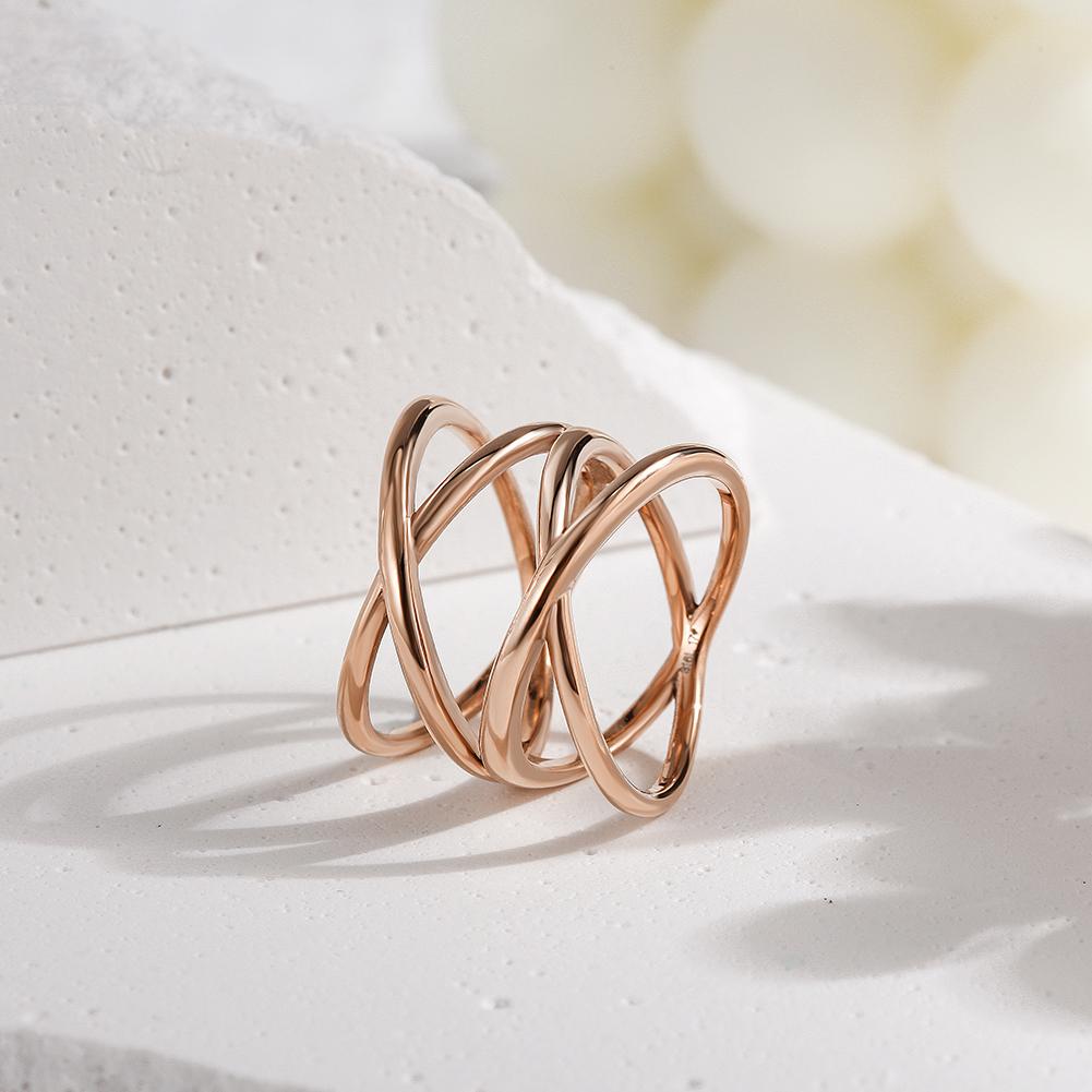 A stylish DOUBLE CROSS RING featuring a unique double crisscross design in durable stainless steel.