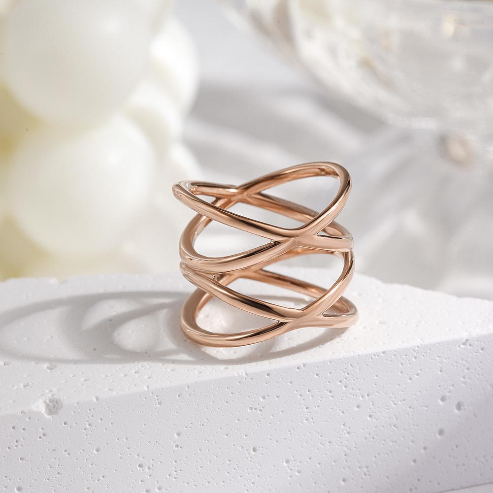 A stylish DOUBLE CROSS RING featuring a unique double crisscross design in durable stainless steel.