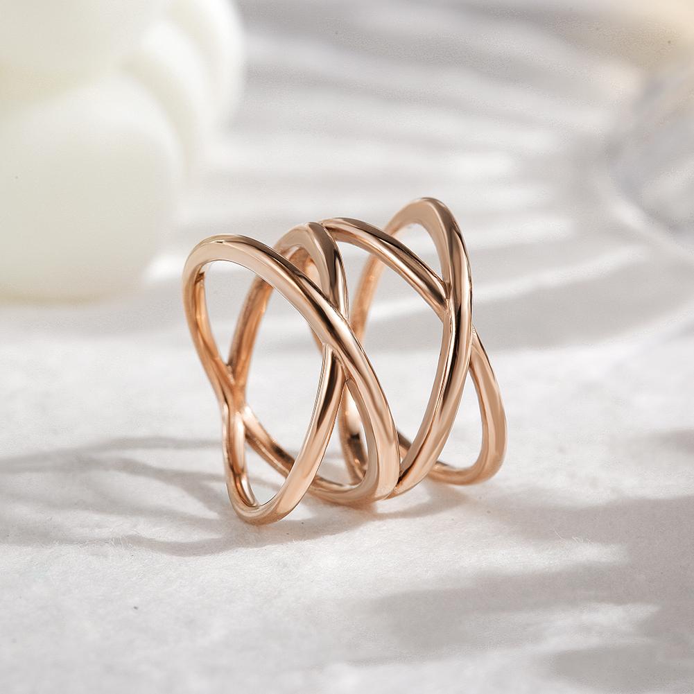 A stylish DOUBLE CROSS RING featuring a unique double crisscross design in durable stainless steel.