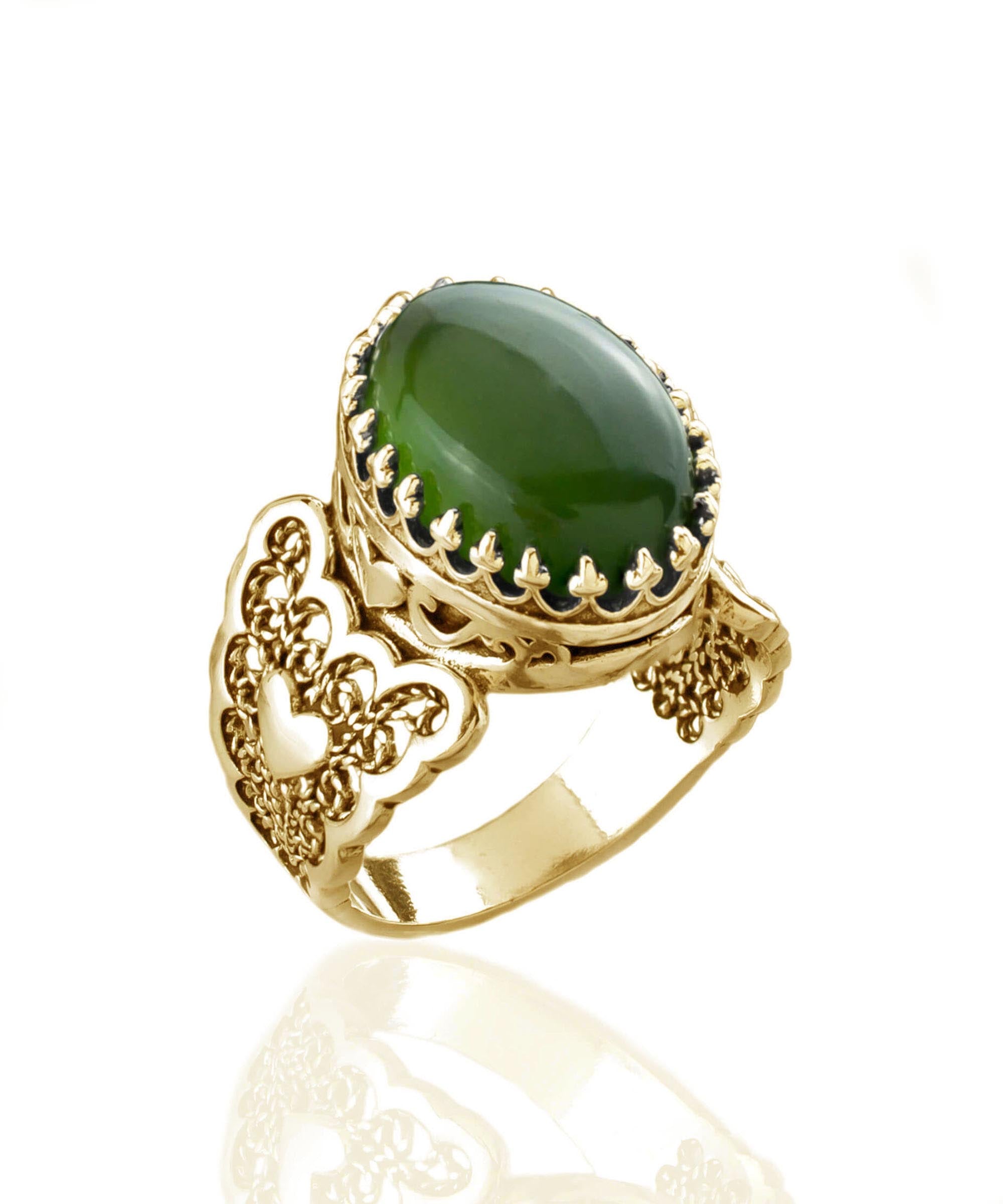 Elegant gold plated cocktail ring featuring double heart design and natural serpentine gemstone, presented in a luxurious gift box.