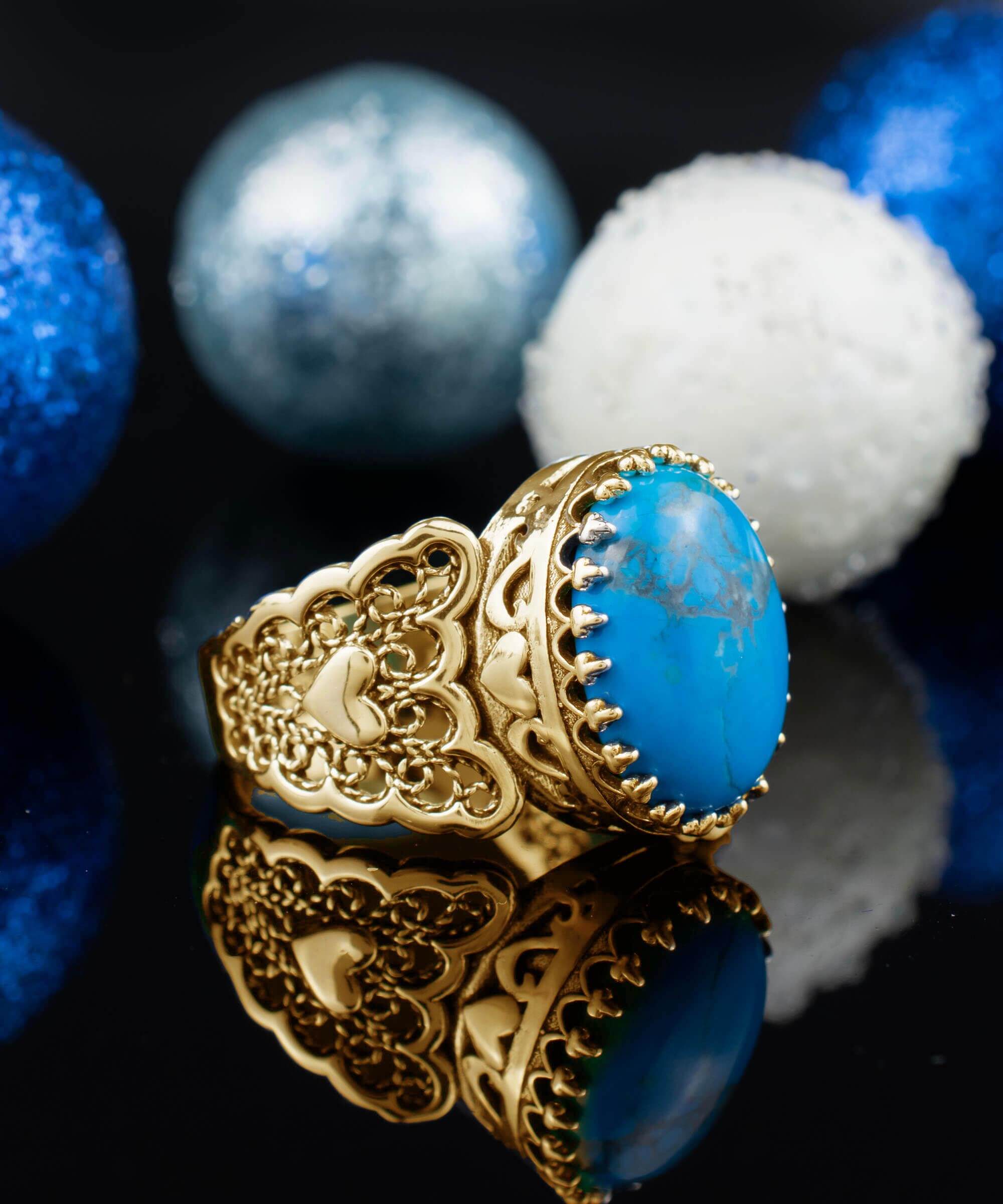 Double Heart Detailed Turquoise Gemstone Filigree Art Gold Plated ring showcasing intricate design and vibrant turquoise stone.