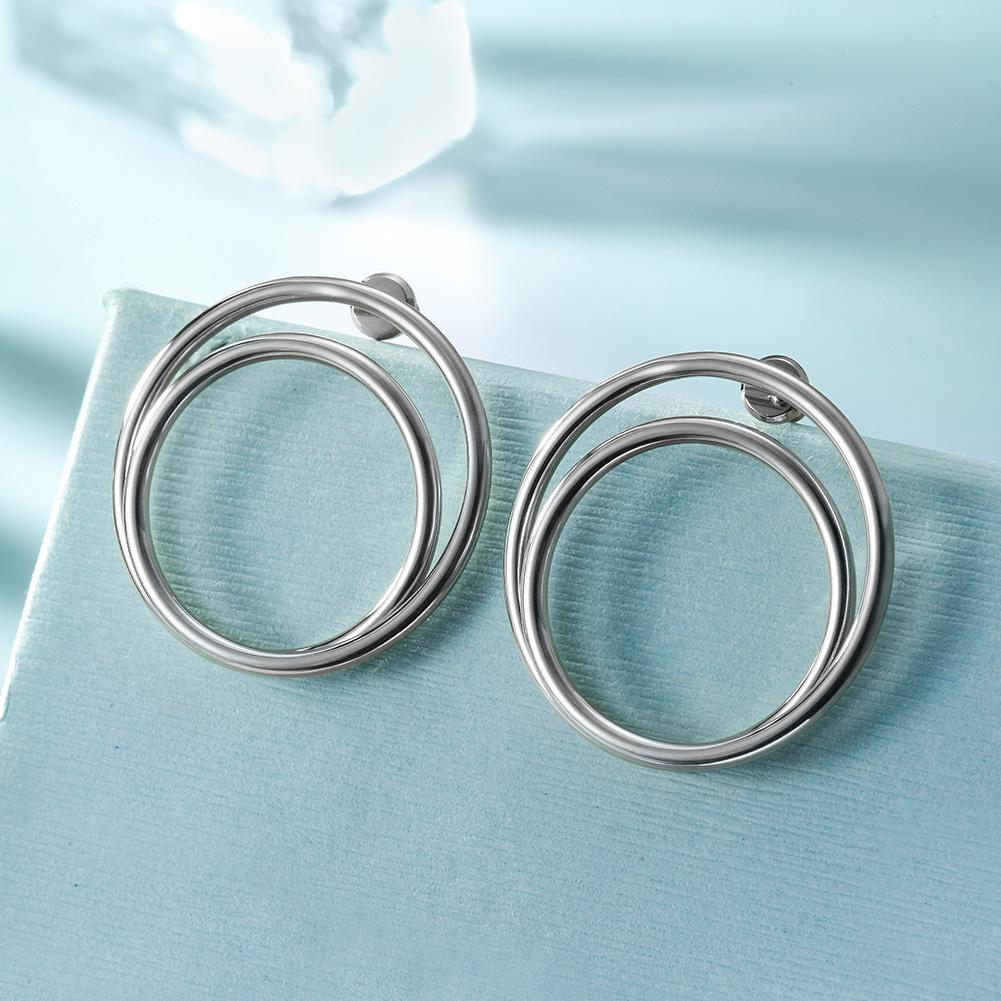 Elegant double layered hoop earrings made from hypoallergenic stainless steel with 14K gold PVD plating.