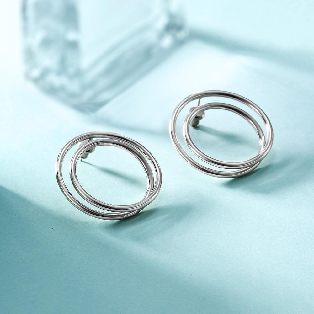 Elegant double layered hoop earrings made from hypoallergenic stainless steel with 14K gold PVD plating.