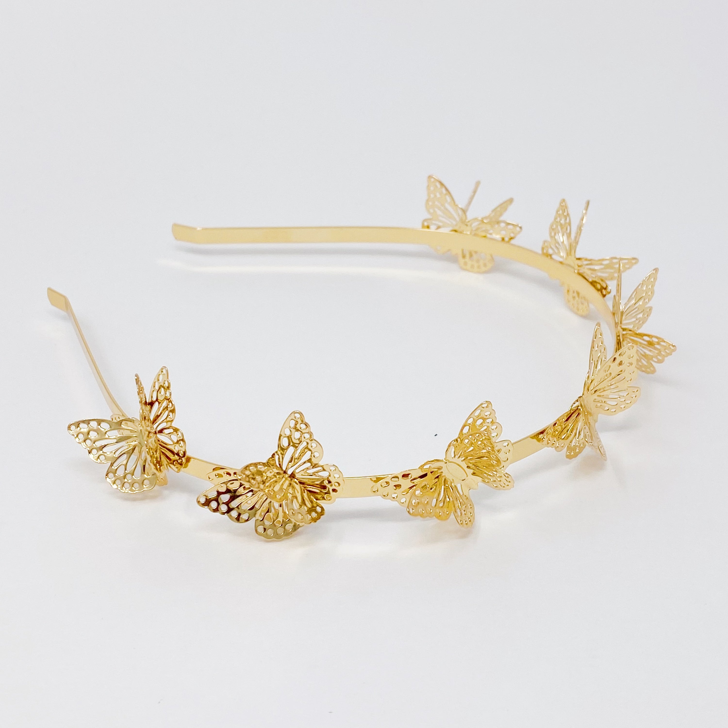 A beautifully crafted Double Wing Butterfly Headband featuring intricate details and a comfortable fit, perfect for any occasion.