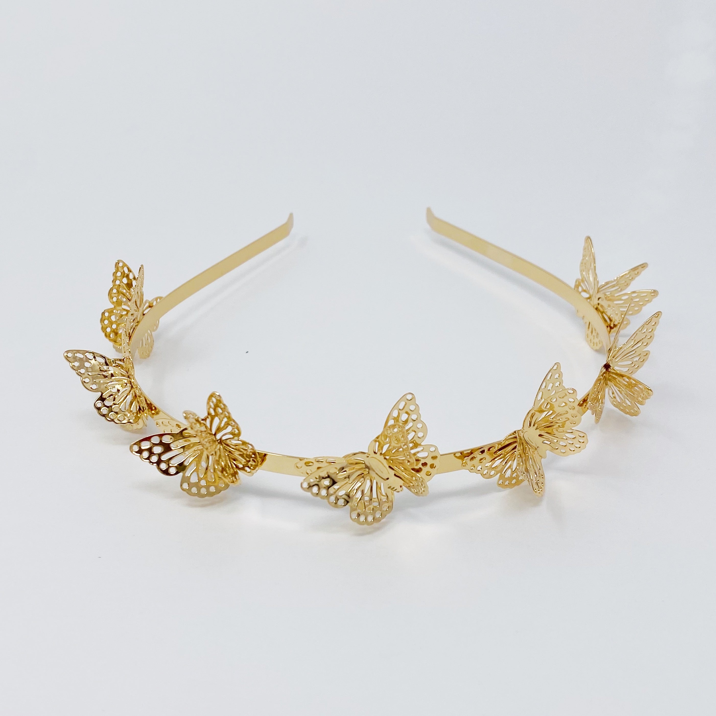 A beautifully crafted Double Wing Butterfly Headband featuring intricate details and a comfortable fit, perfect for any occasion.