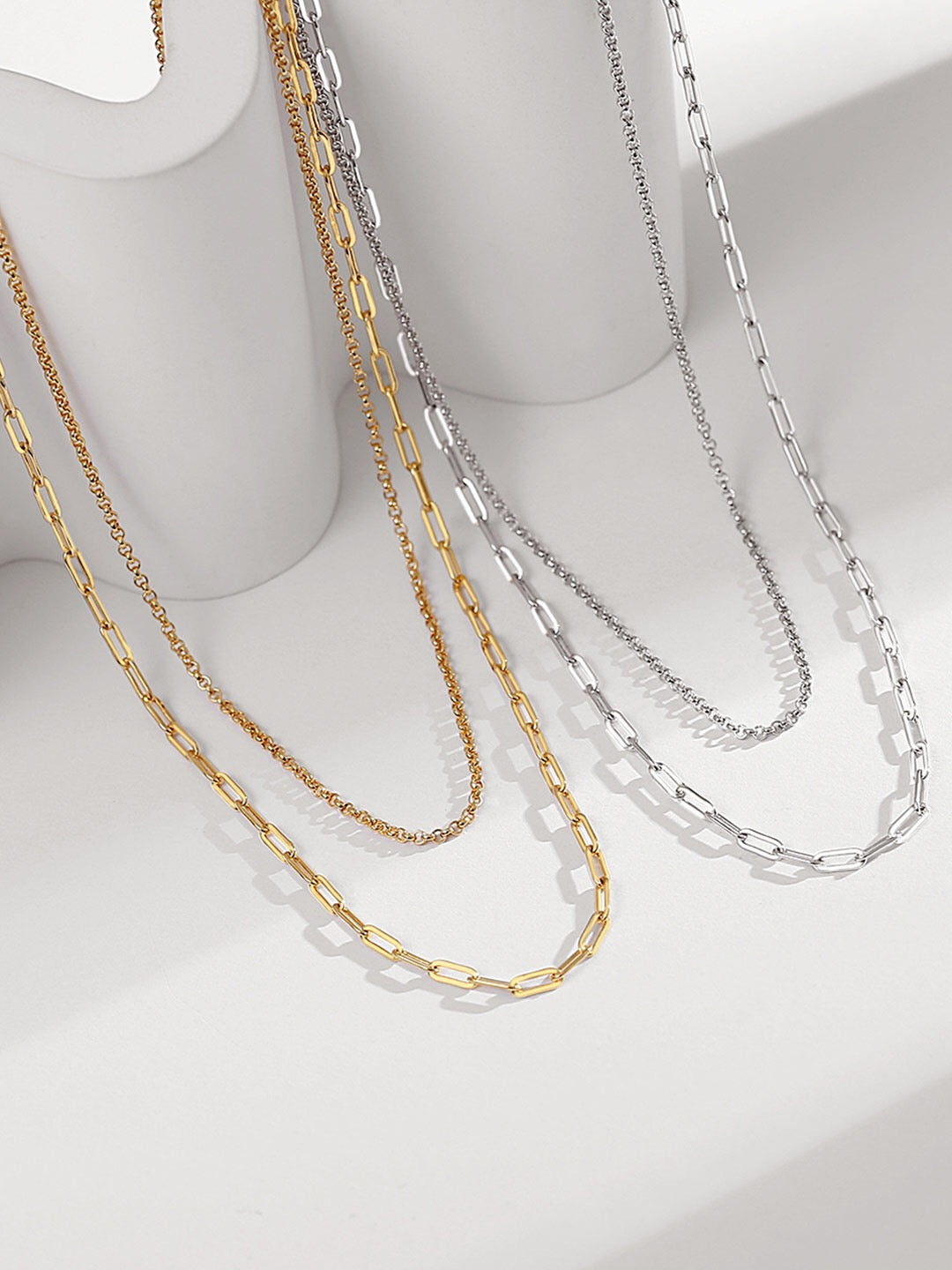 A stunning double-layered necklace made of gold vermeil, showcasing its elegant design and adjustable chain length.