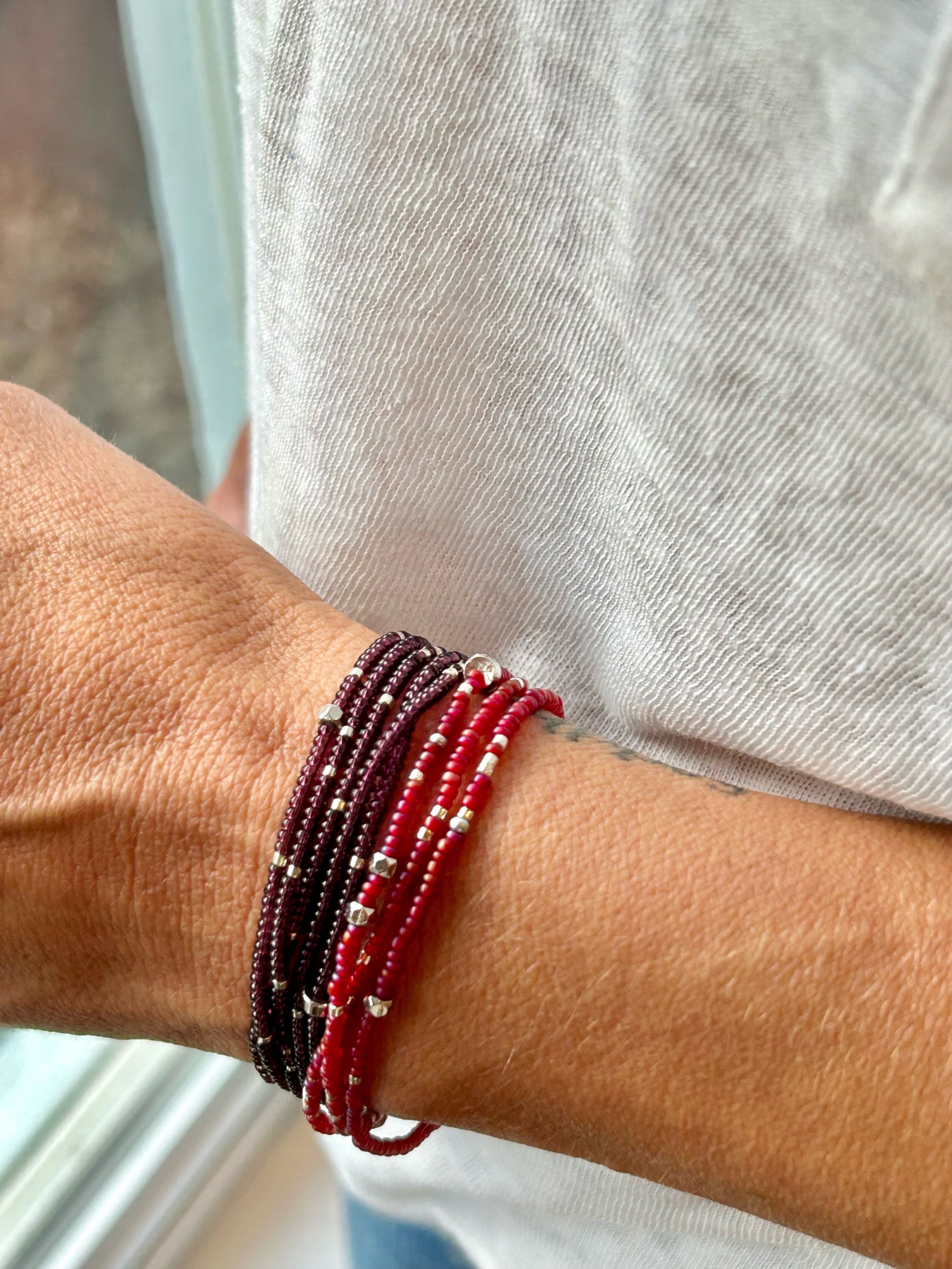 Double-Up 2-Piece Silver-Sprinkle Beaded 8-Wrap Bracelet featuring magenta and mauve colors with silver glass Czech beads.