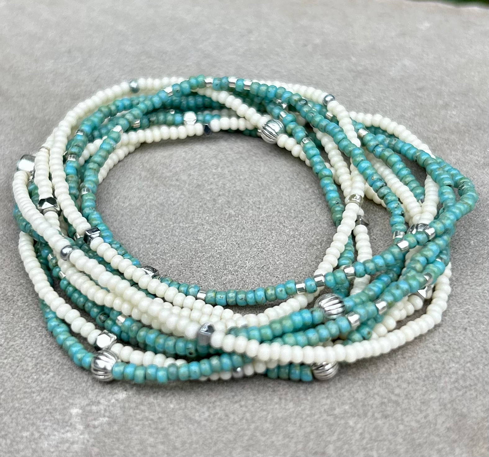 Double-Up 2-Piece Turquoise & Silver Beaded Wrap Bracelet featuring vibrant turquoise Czech glass beads and metallic silver accents, elegantly wrapped around a wrist.