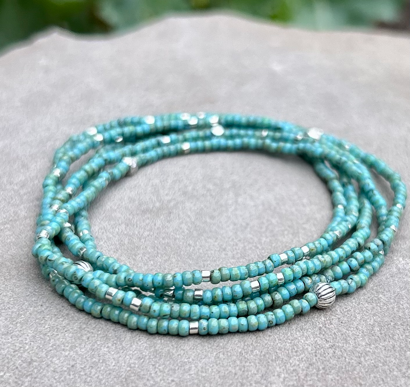 Double-Up 2-Piece Turquoise & Silver Beaded Wrap Bracelet featuring vibrant turquoise Czech glass beads and metallic silver accents, elegantly wrapped around a wrist.