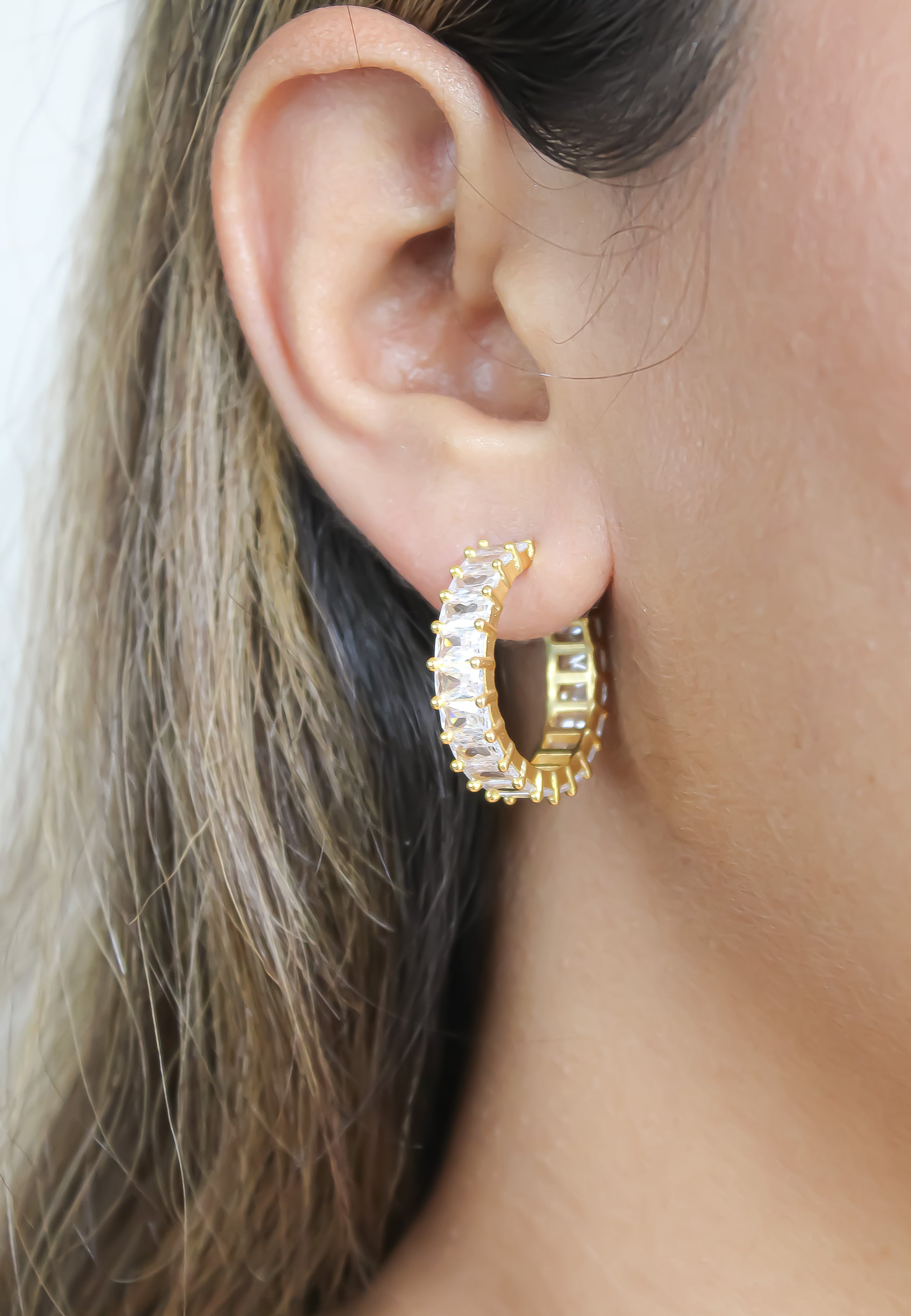 Elegant Downtown Earrings featuring 18K gold plating and emerald cut zirconia stones, perfect for pierced ears.