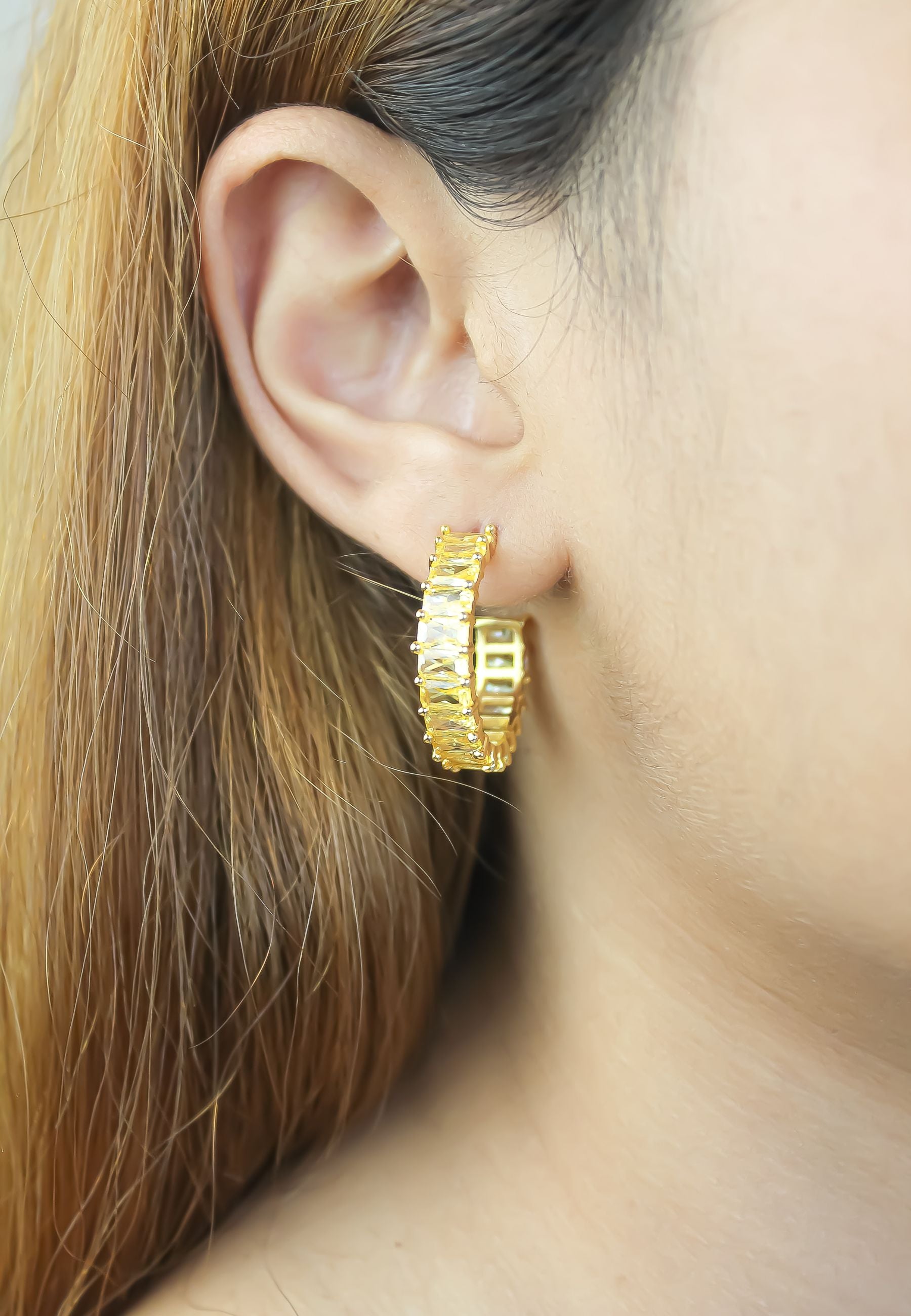 Elegant Downtown Earrings featuring 18K gold plating and emerald cut zirconia stones, perfect for pierced ears.