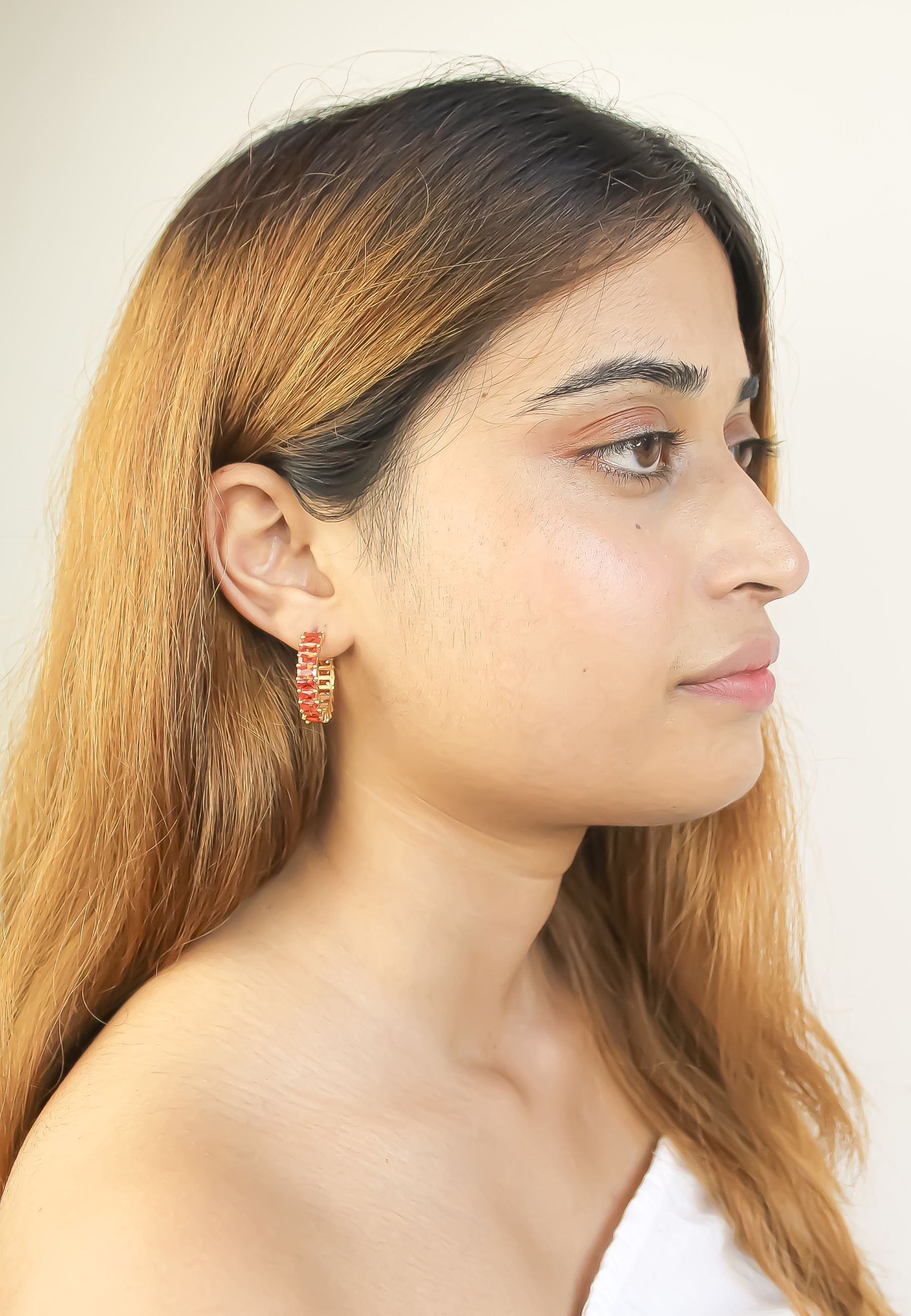 Elegant Downtown Earrings featuring 18K gold plating and emerald cut zirconia stones, perfect for pierced ears.