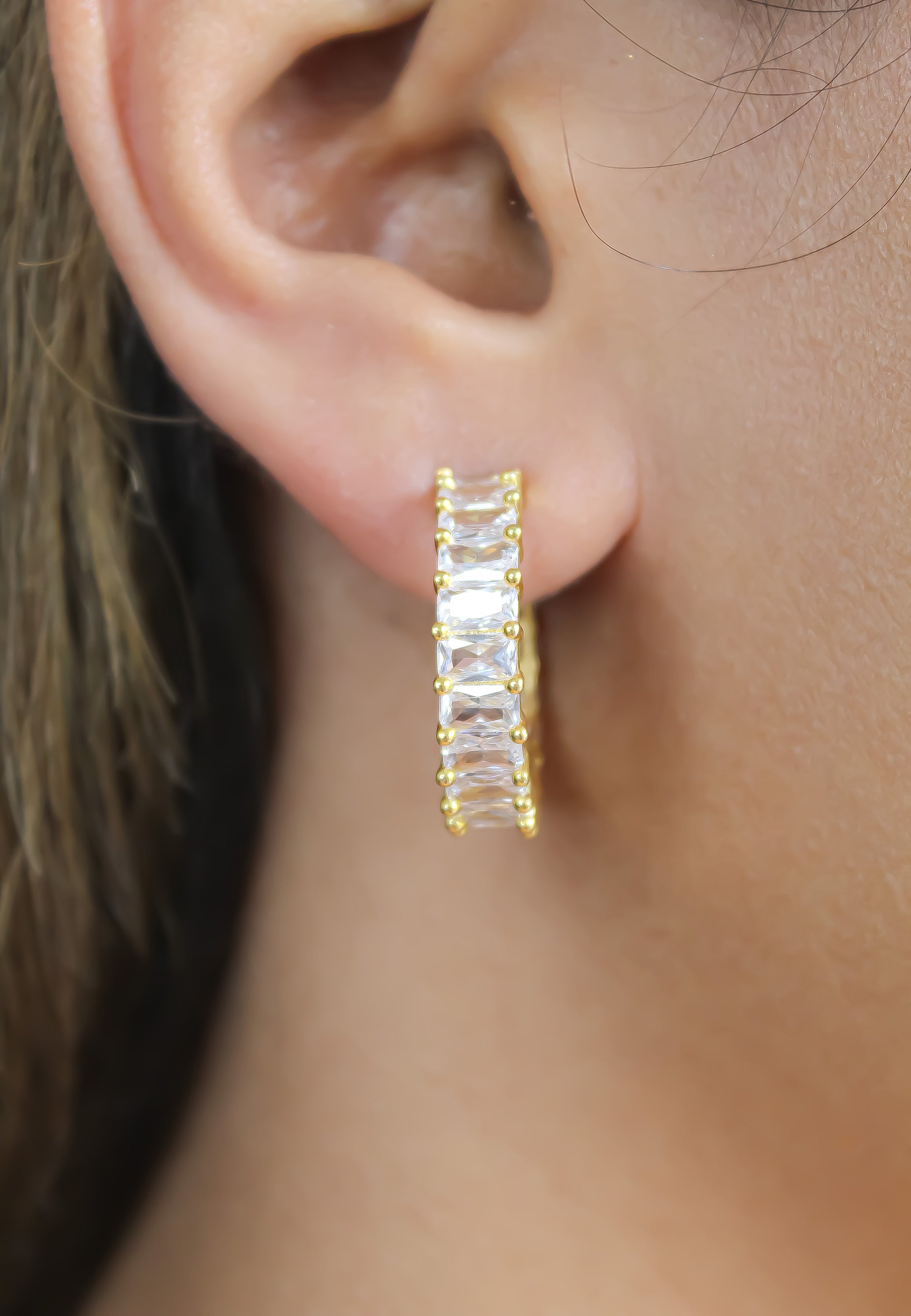 Elegant Downtown Earrings featuring 18K gold plating and emerald cut zirconia stones, perfect for pierced ears.